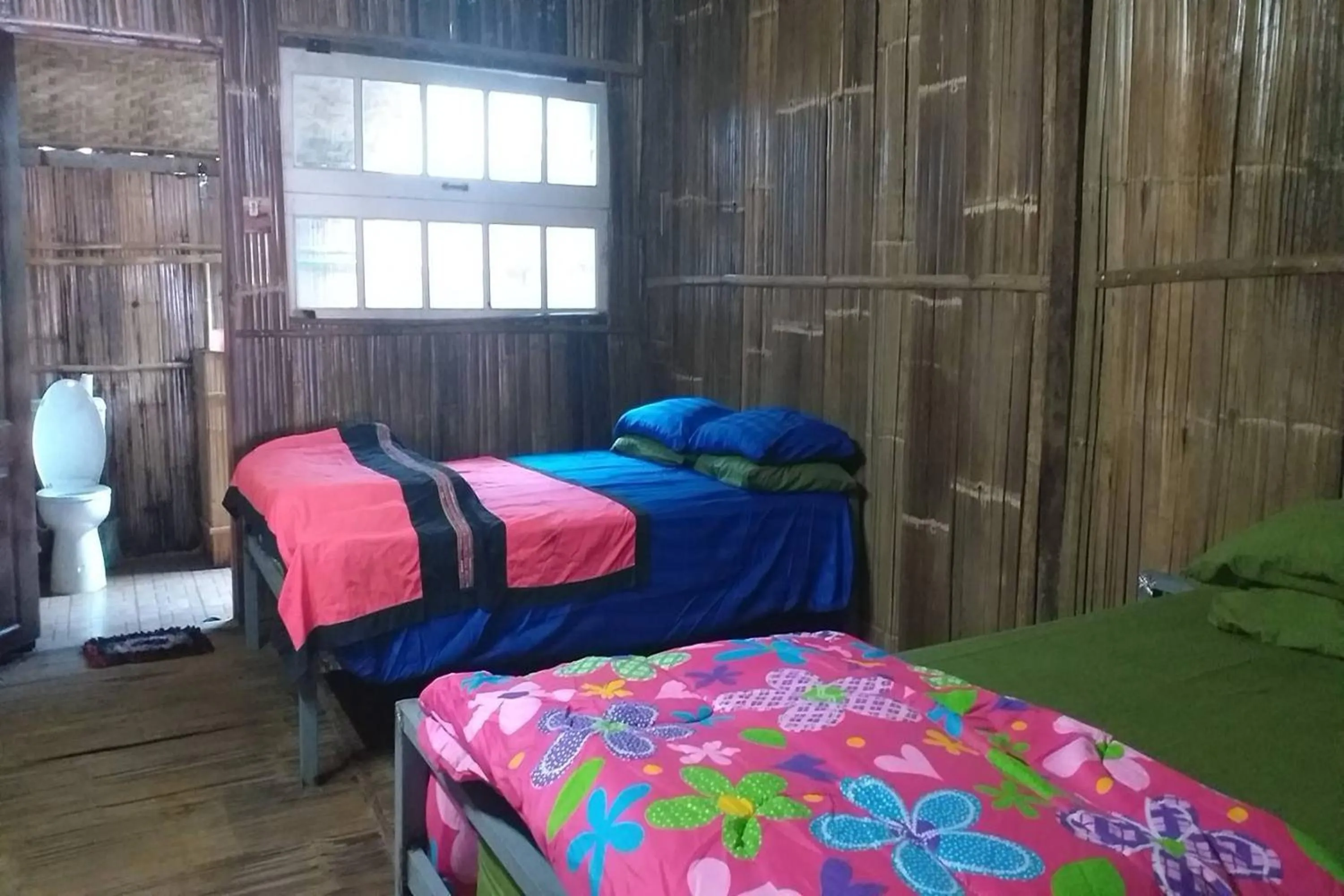 Bed in Doi PuMuen LAHU Homestay