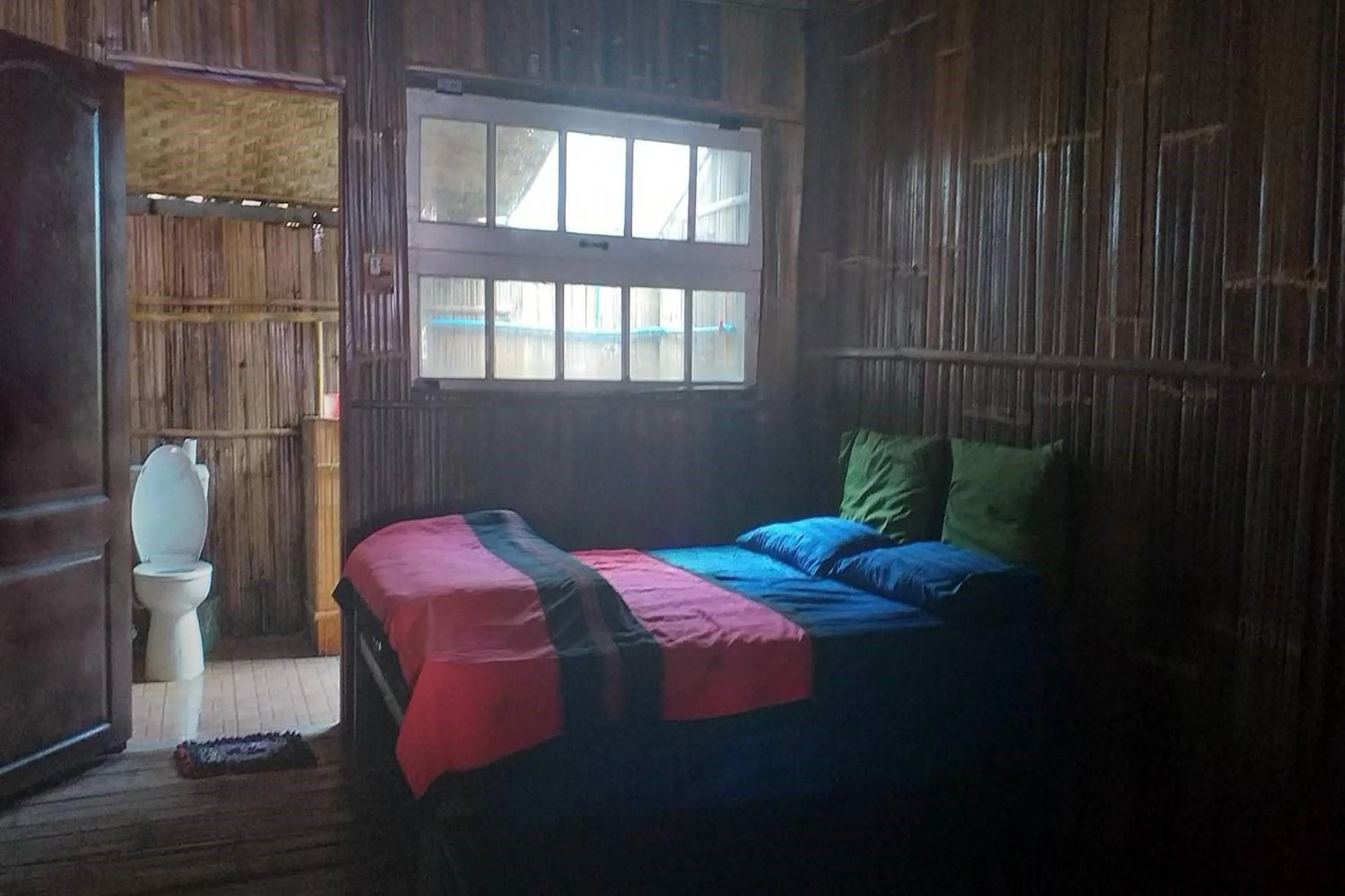 Bed in Doi PuMuen LAHU Homestay