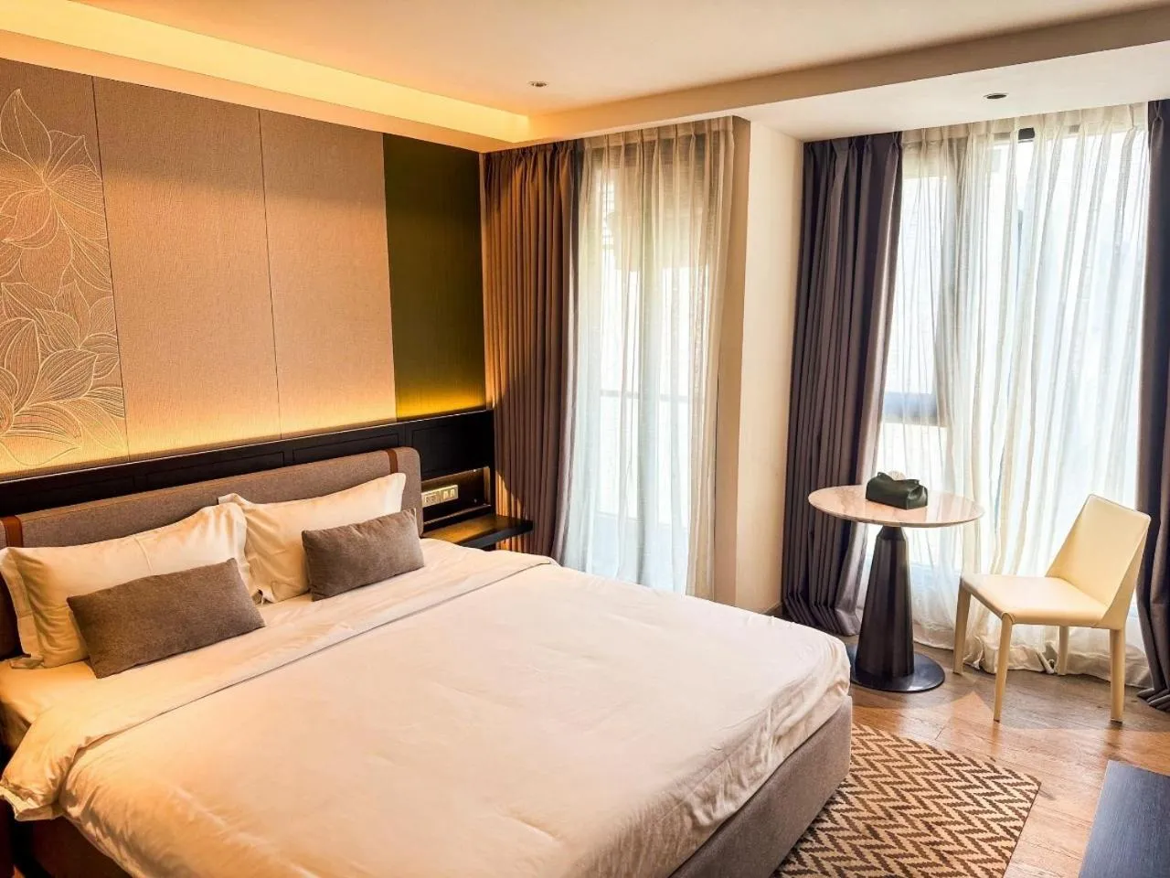 Bed in Cha Chiangmai Luxury