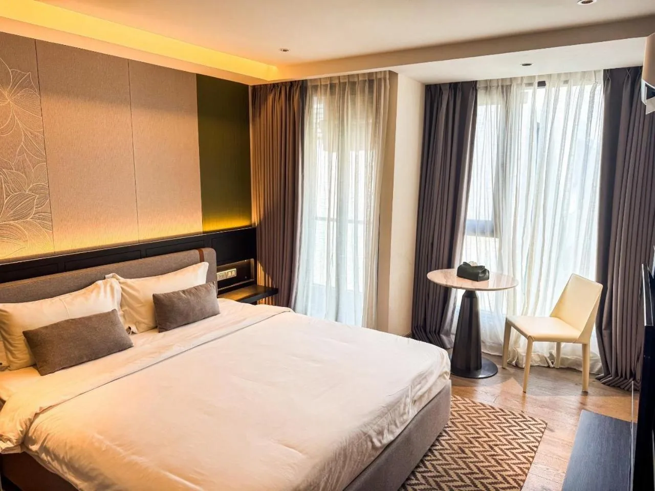 Bed in Cha Chiangmai Luxury