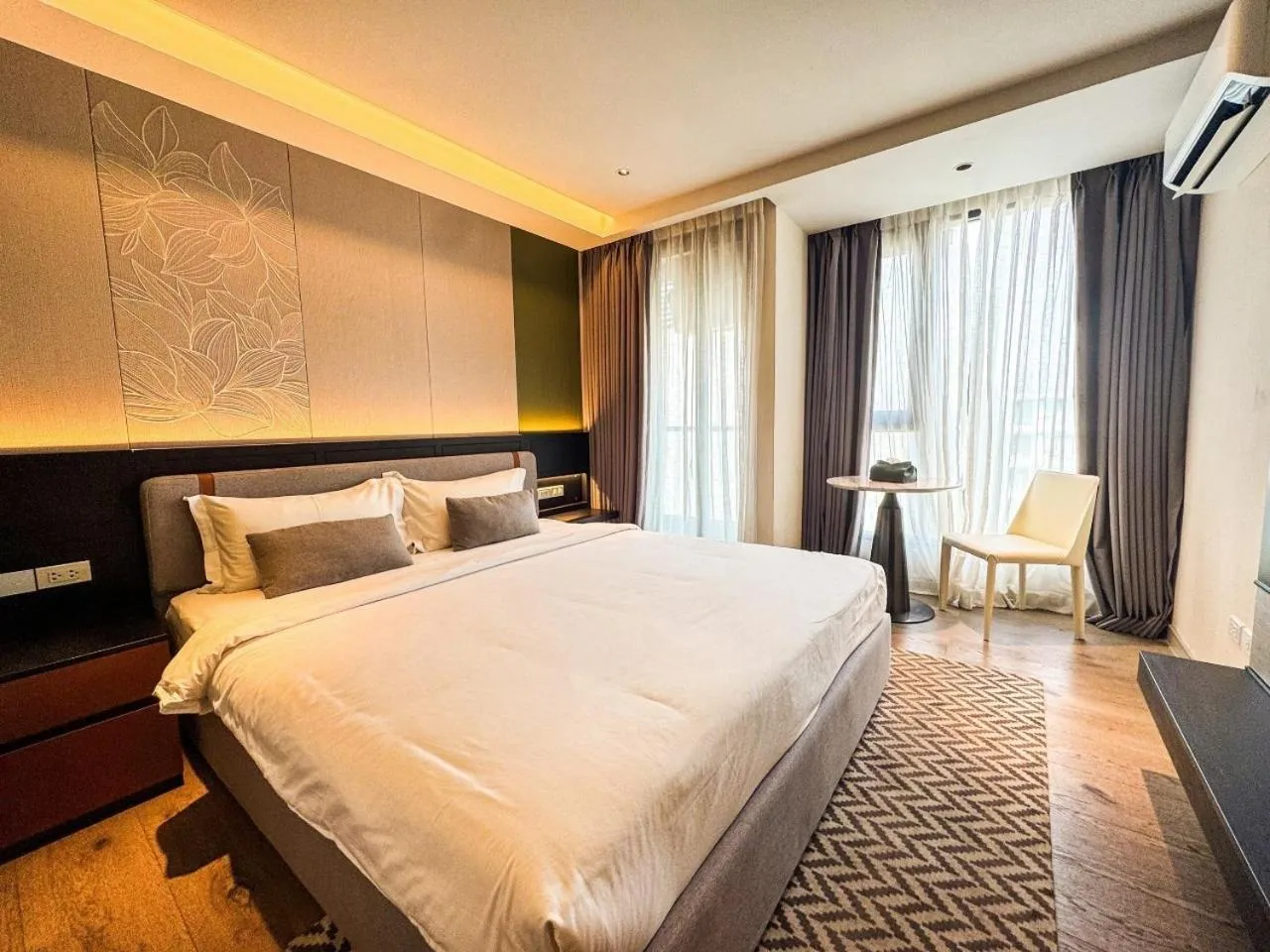 Bed in Cha Chiangmai Luxury