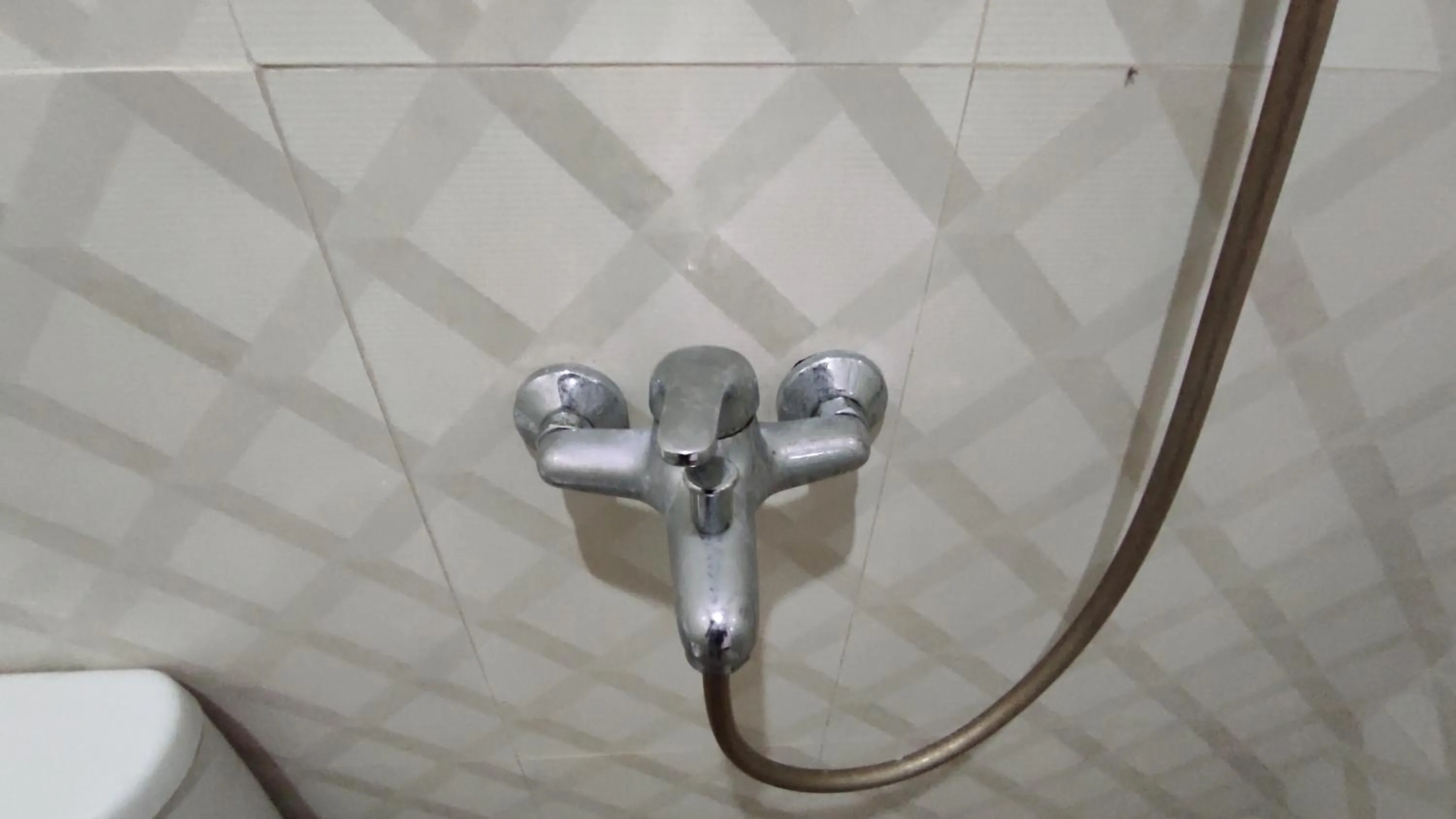 Bathroom in Hotel O Wisma Syariah Dian Near Pare-pare