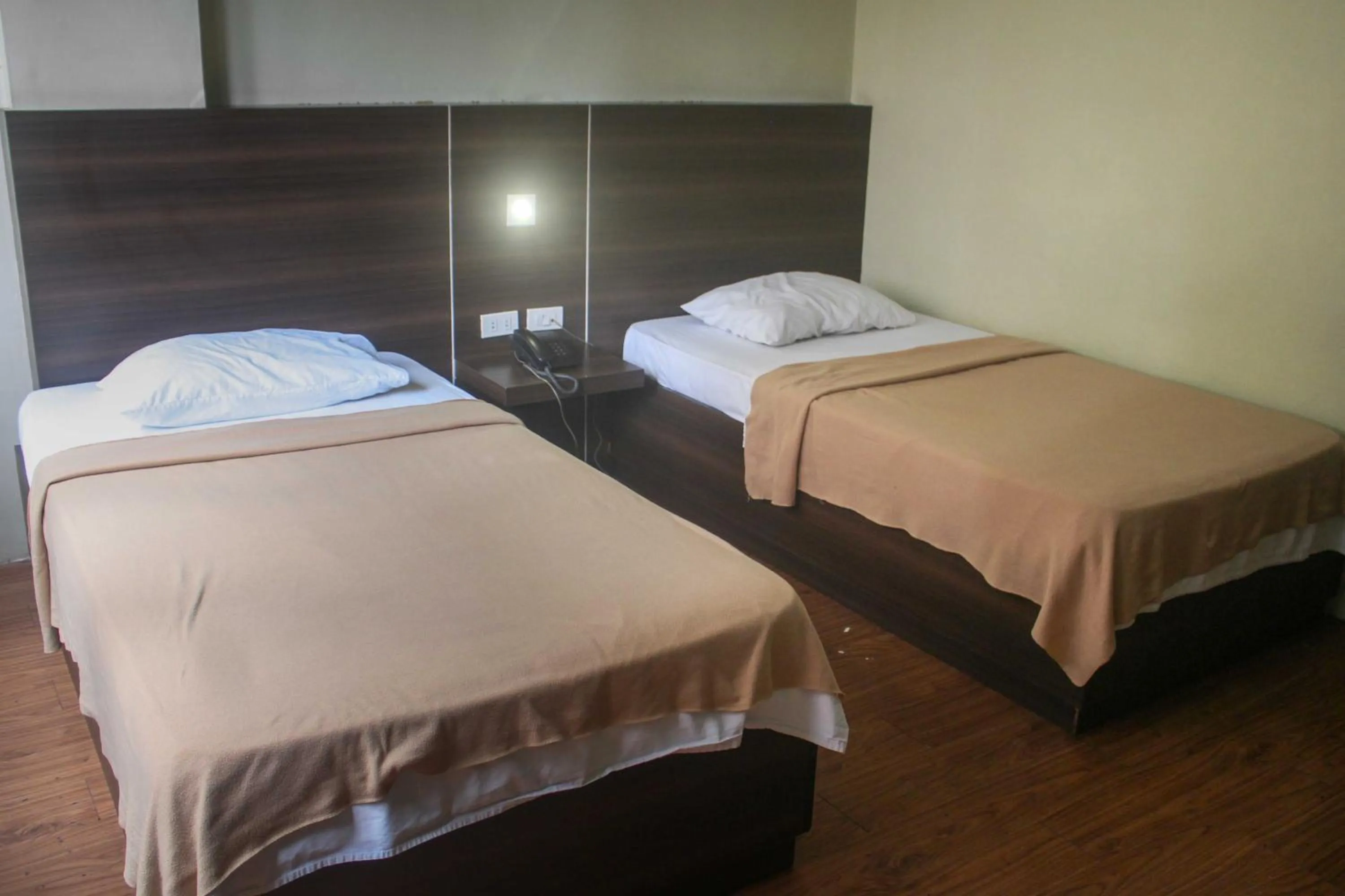 Bedroom, Bed in OYO 1011 First Hotel