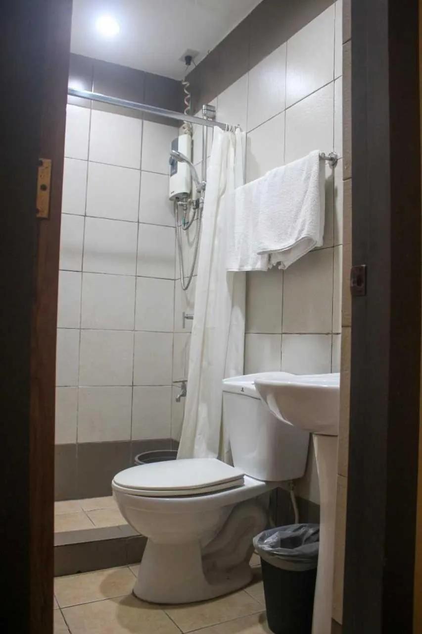 Bathroom in OYO 1011 First Hotel