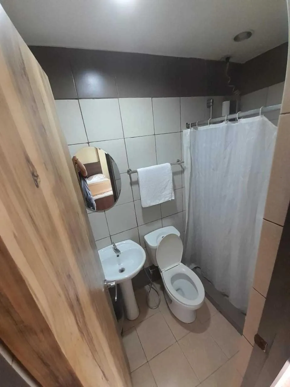 Bathroom in OYO 1011 First Hotel