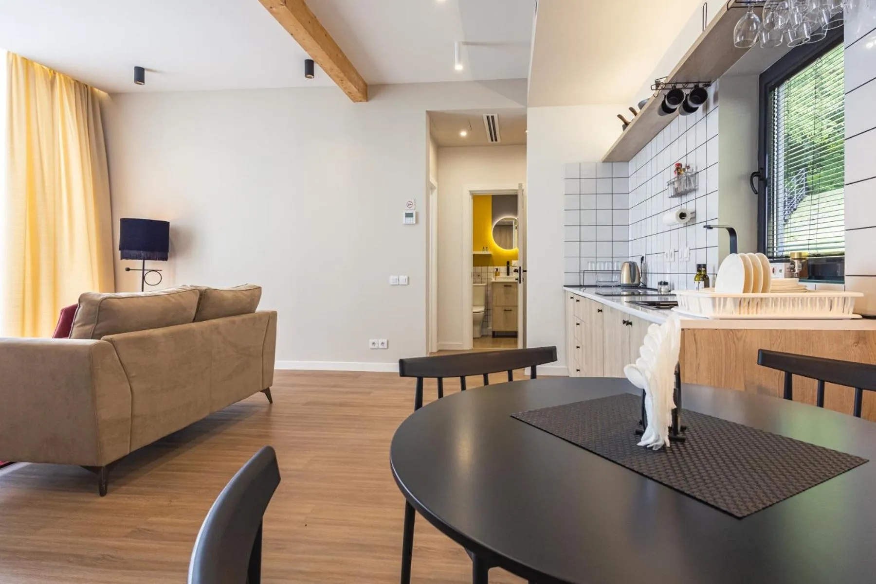 Kitchen or kitchenette in Apart Hotel Kundzuli