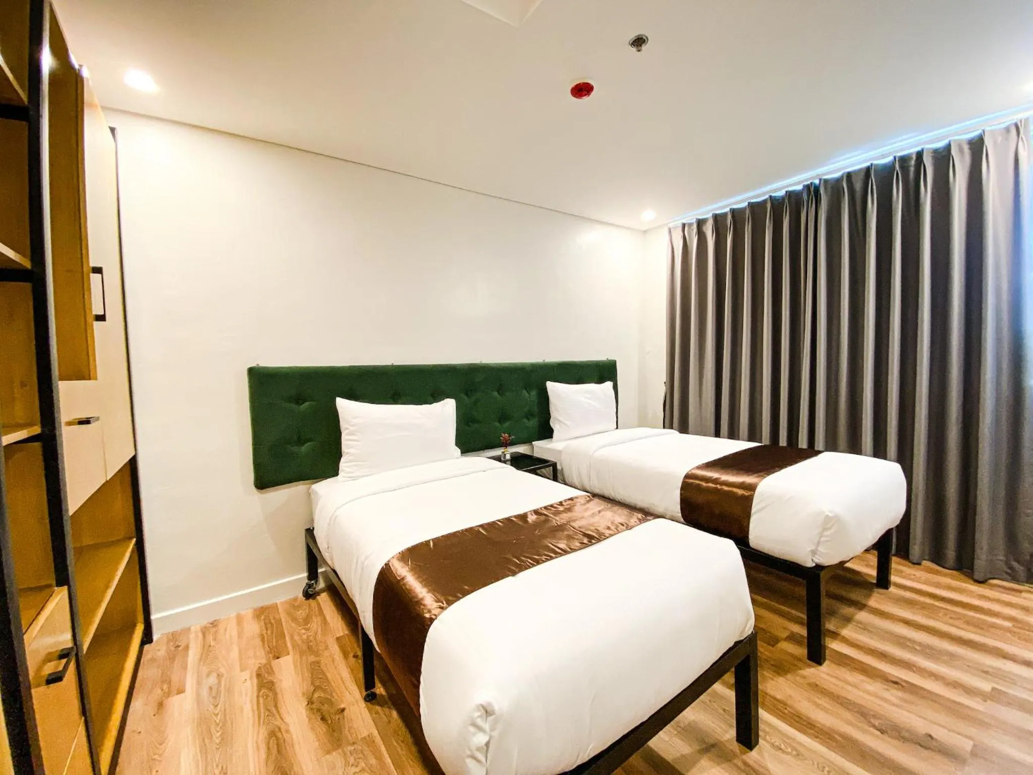 Bed in Wesfame Suites