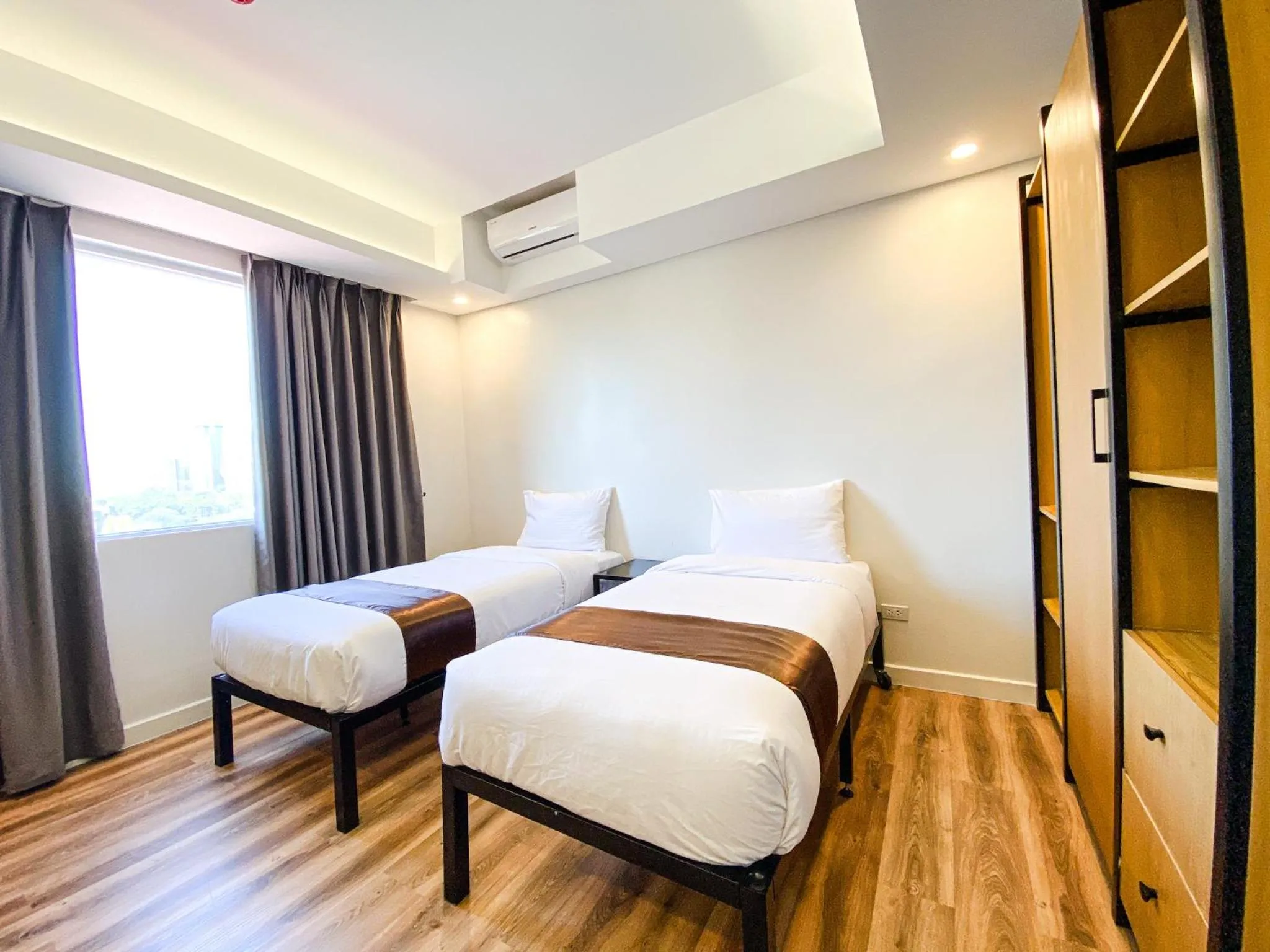 Bed in Wesfame Suites