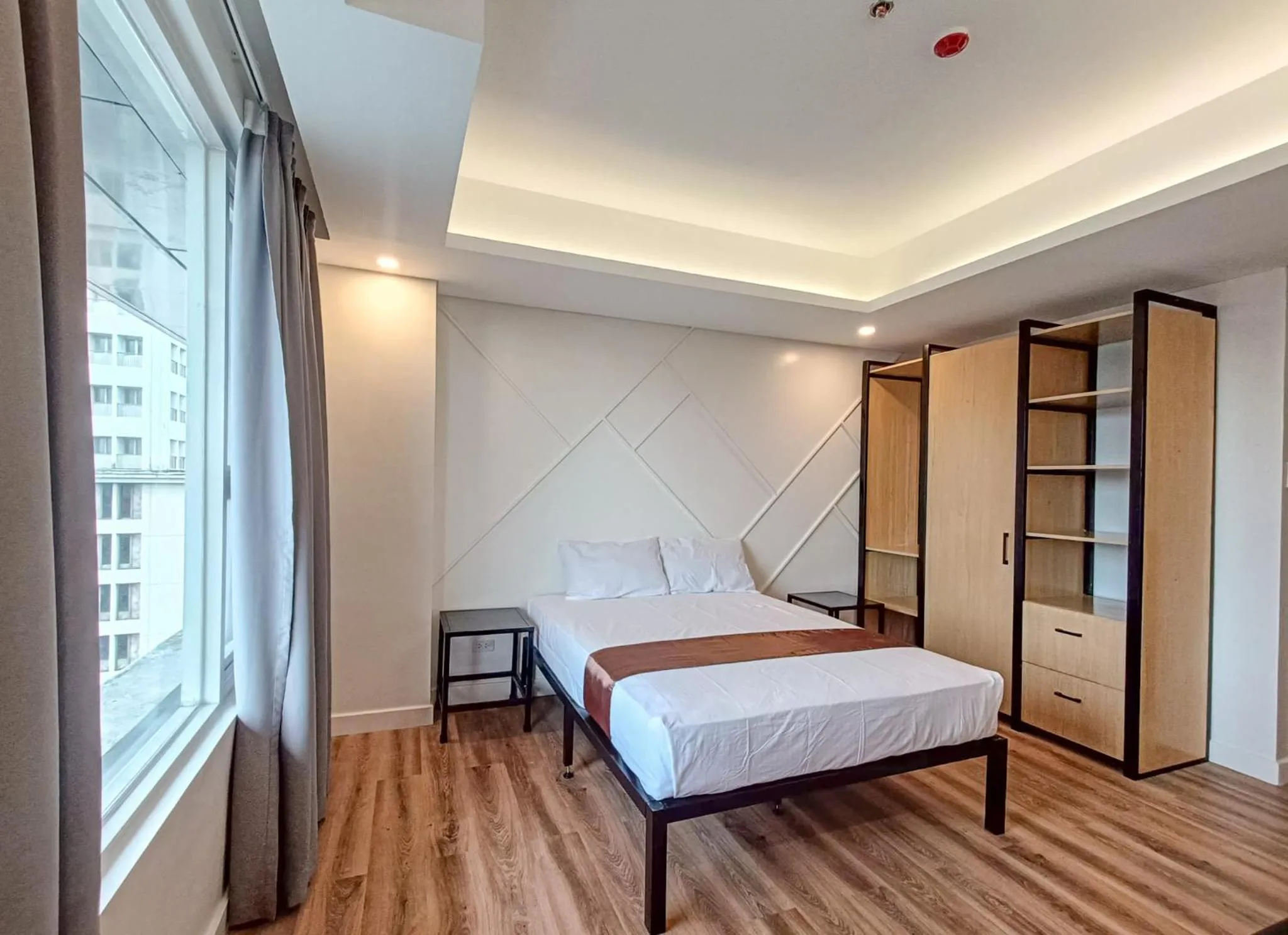 Bed in Wesfame Suites