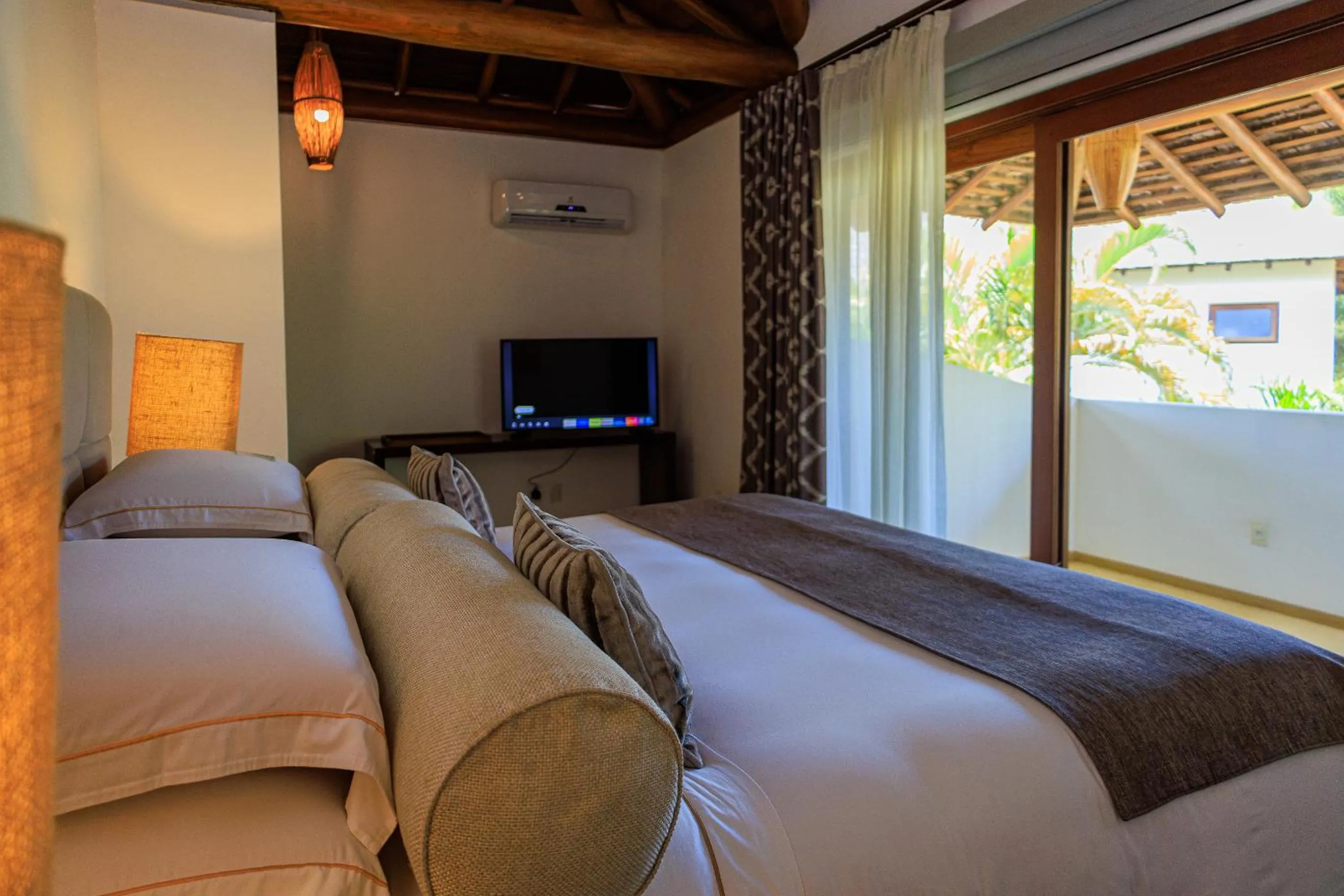 Bed in Campo Bahia Hotel Villas Spa