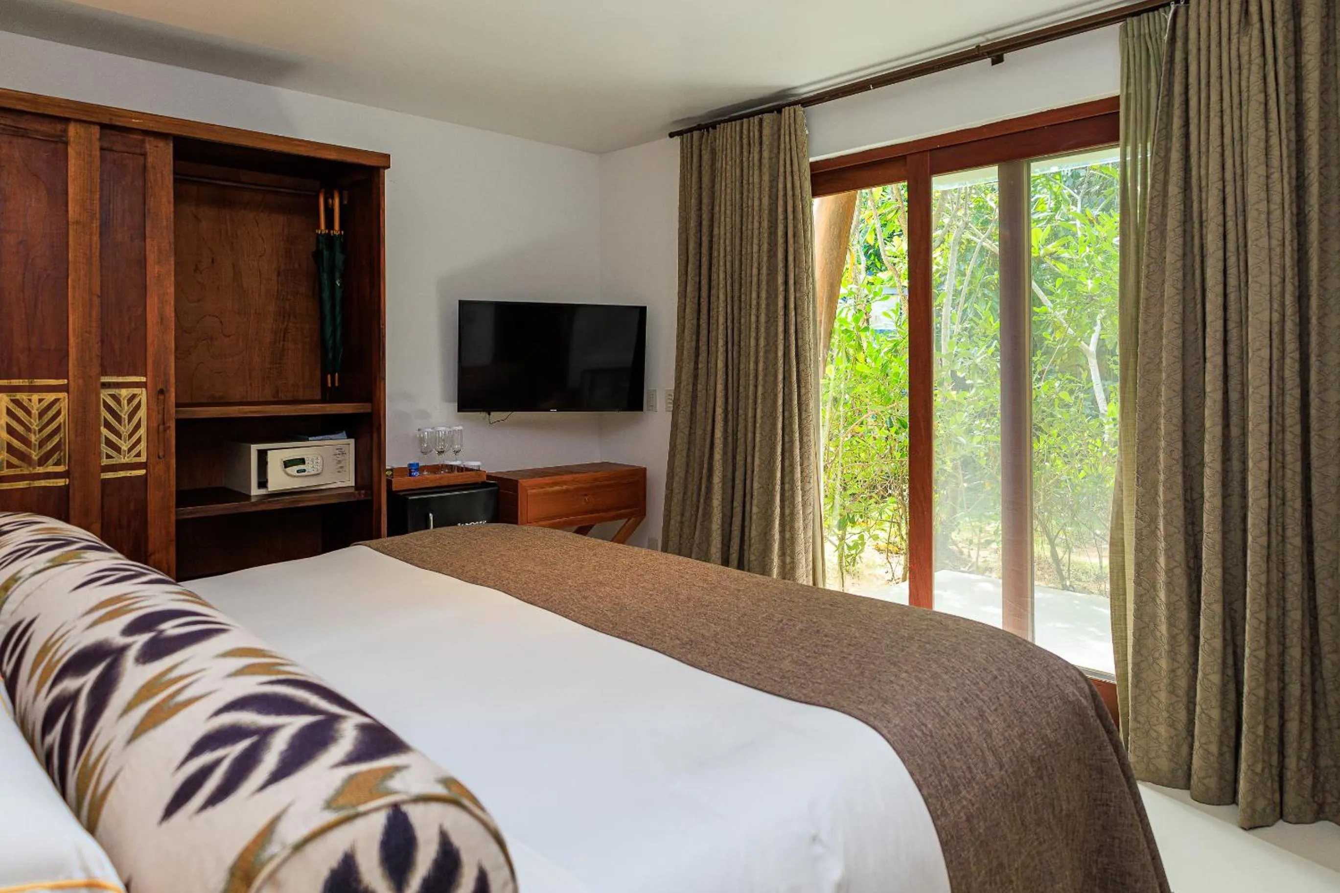 Bed in Campo Bahia Hotel Villas Spa