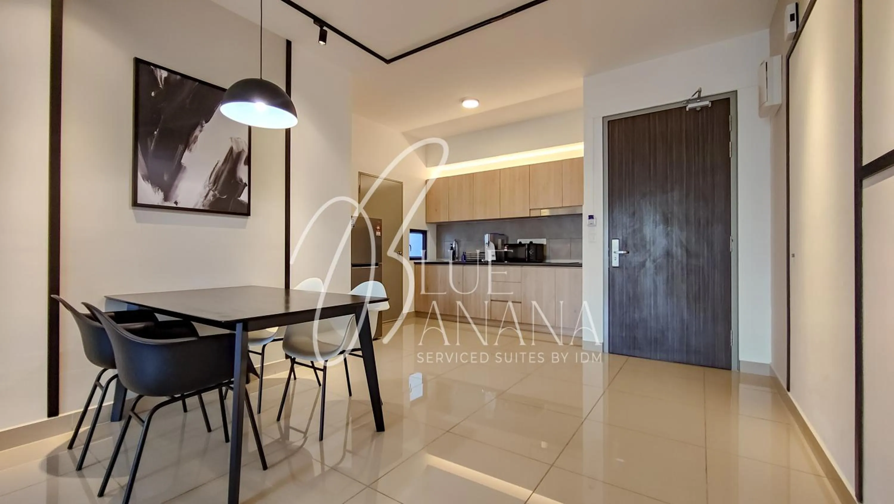 Dining area in M Vertica Premier Suites by BlueBanana