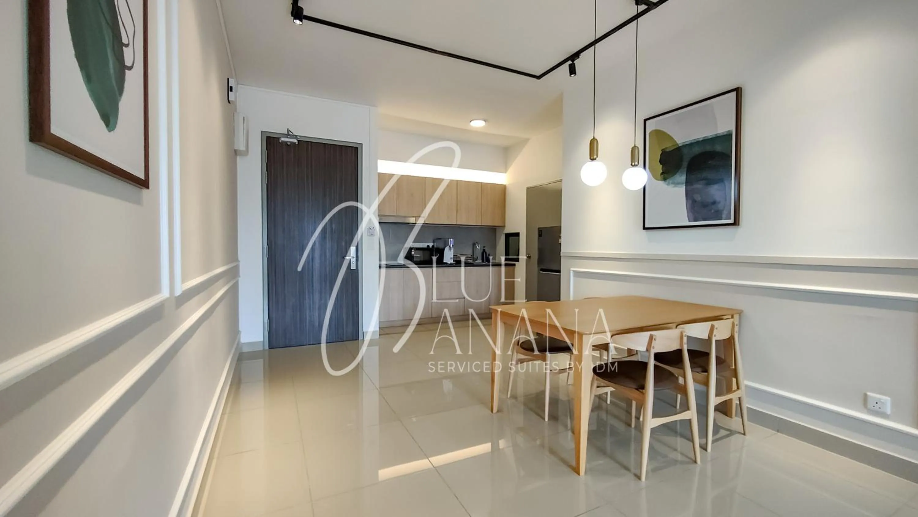 Dining area in M Vertica Premier Suites by BlueBanana