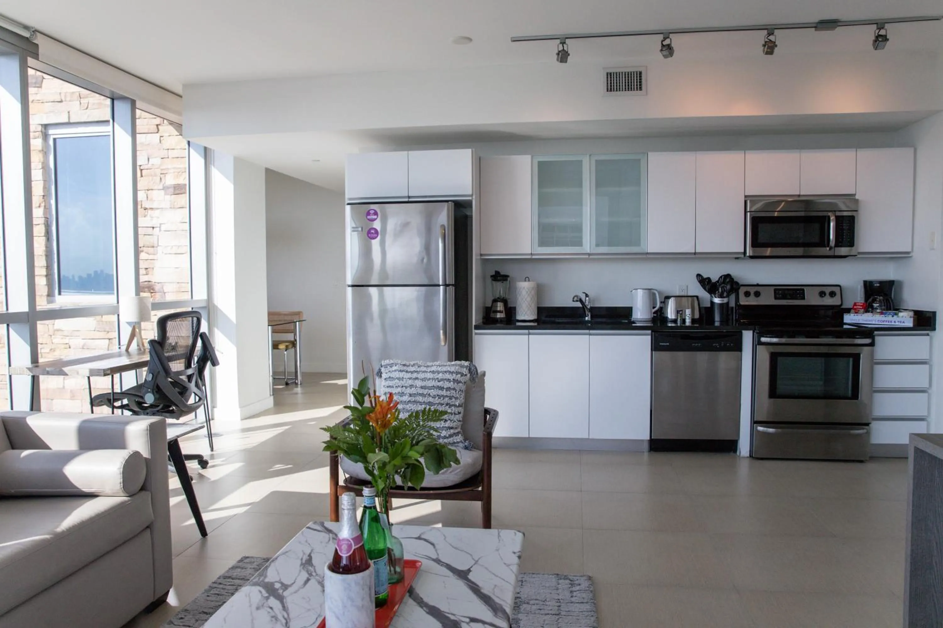 kitchen in Dharma Home Suites Miami Beach at Monte Carlo