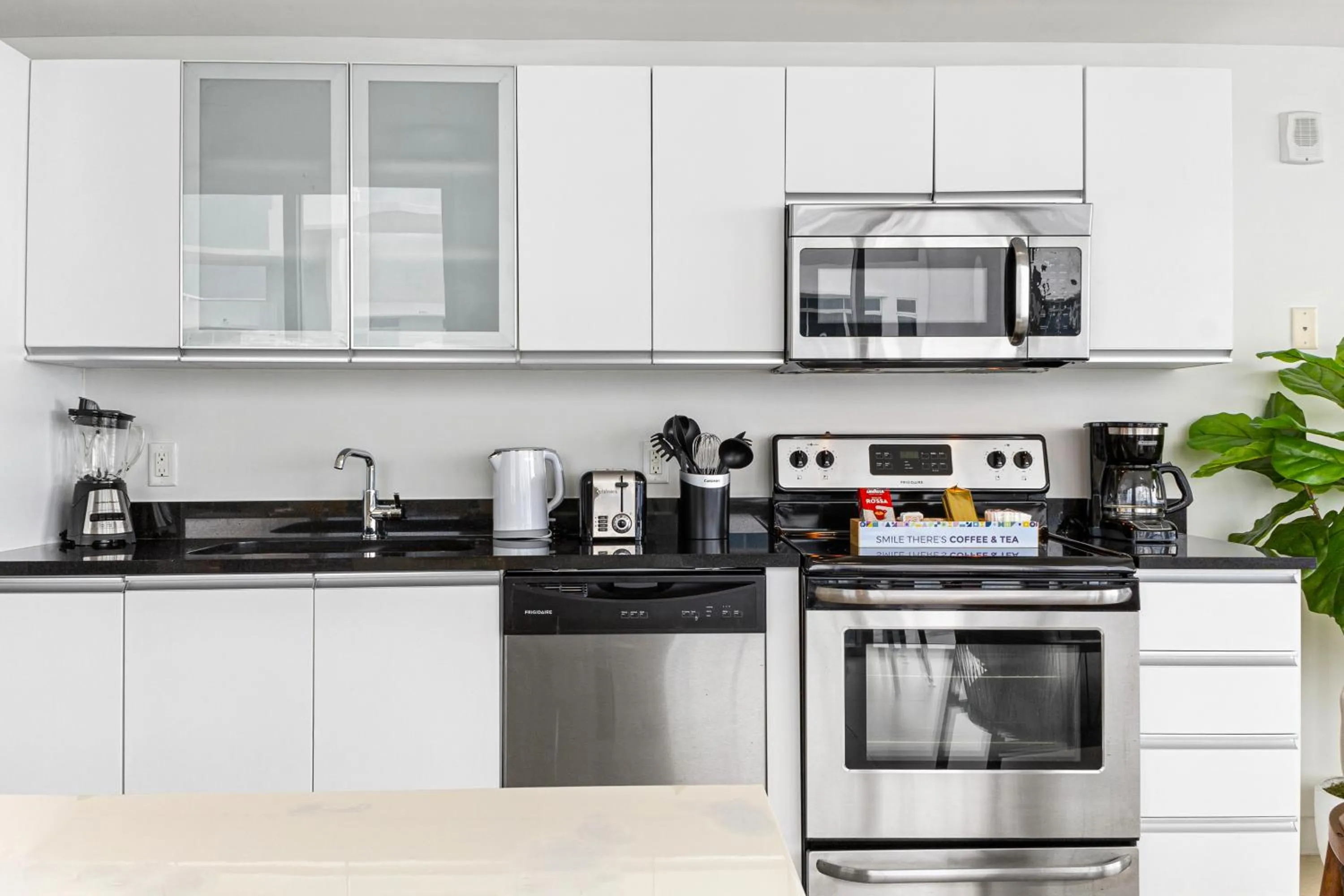 kitchen in Dharma Home Suites Miami Beach at Monte Carlo