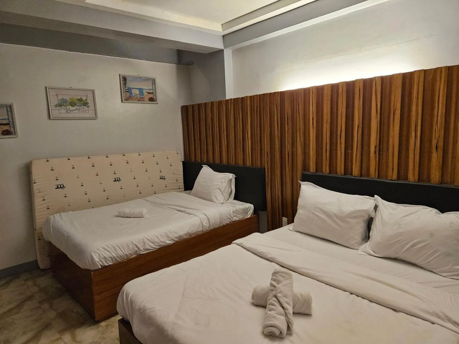 Bed in Grand Mercy Hotel