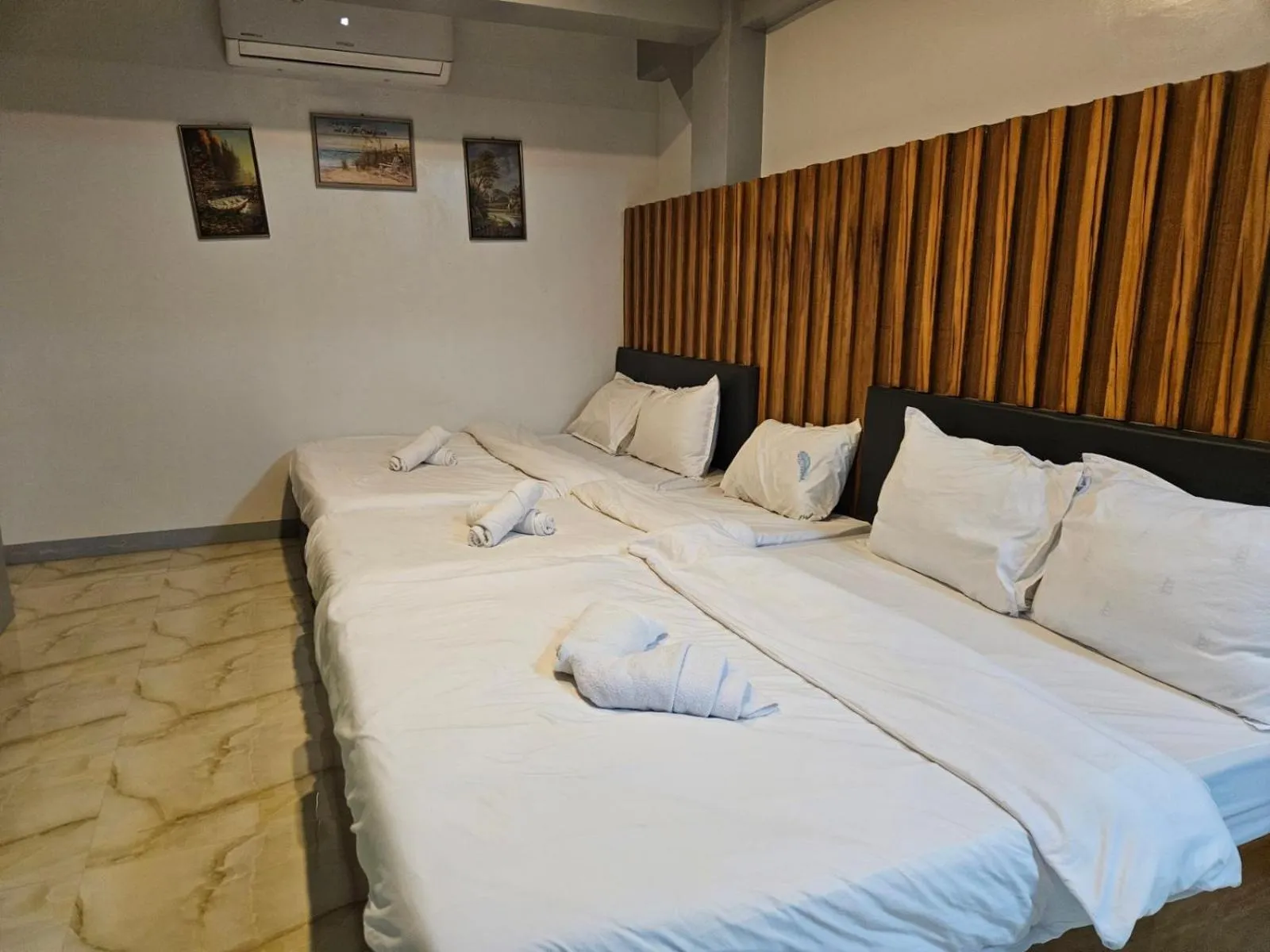 Bed in Grand Mercy Hotel