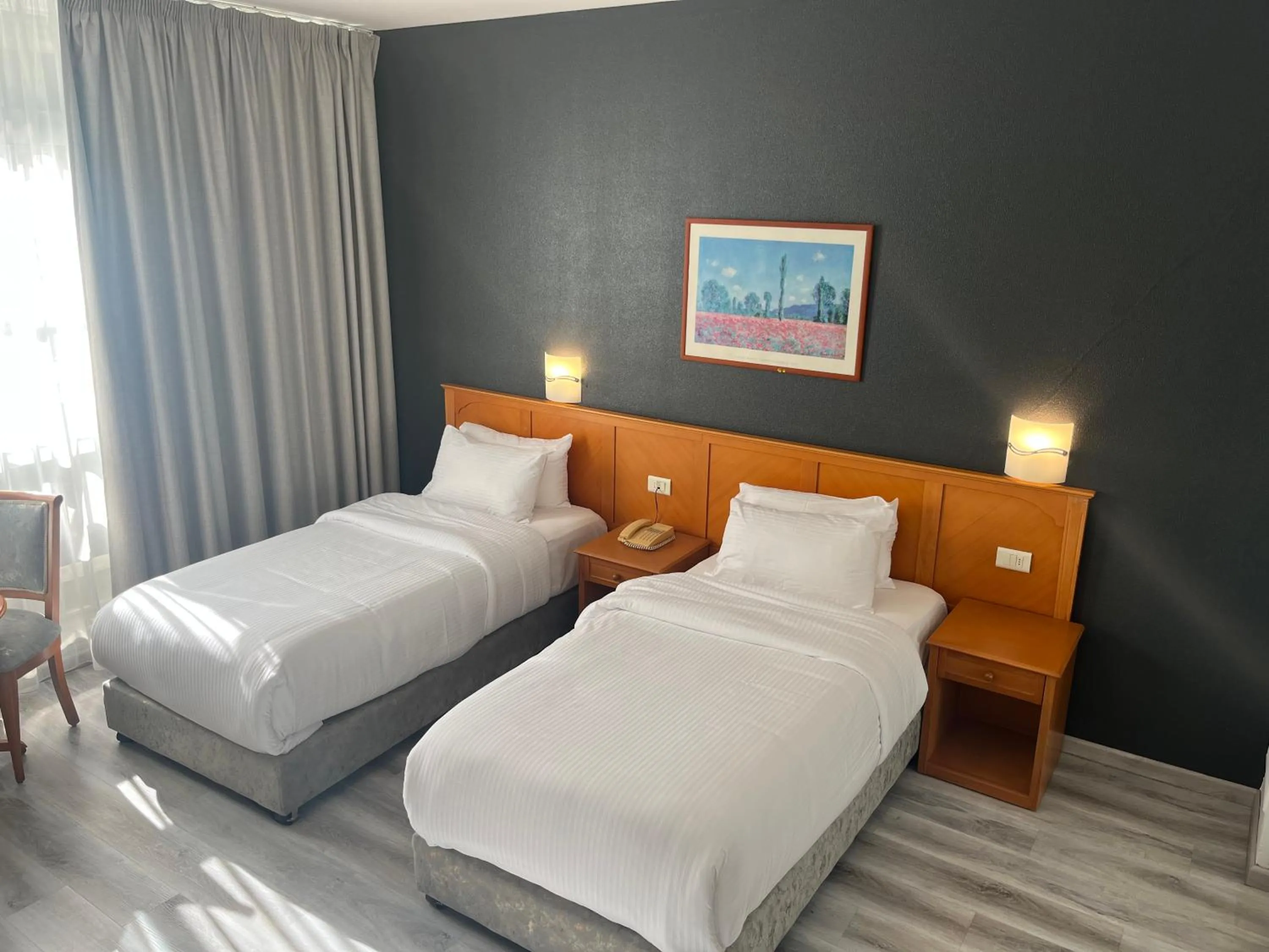 Bed in El Sheikh Suites Hotel