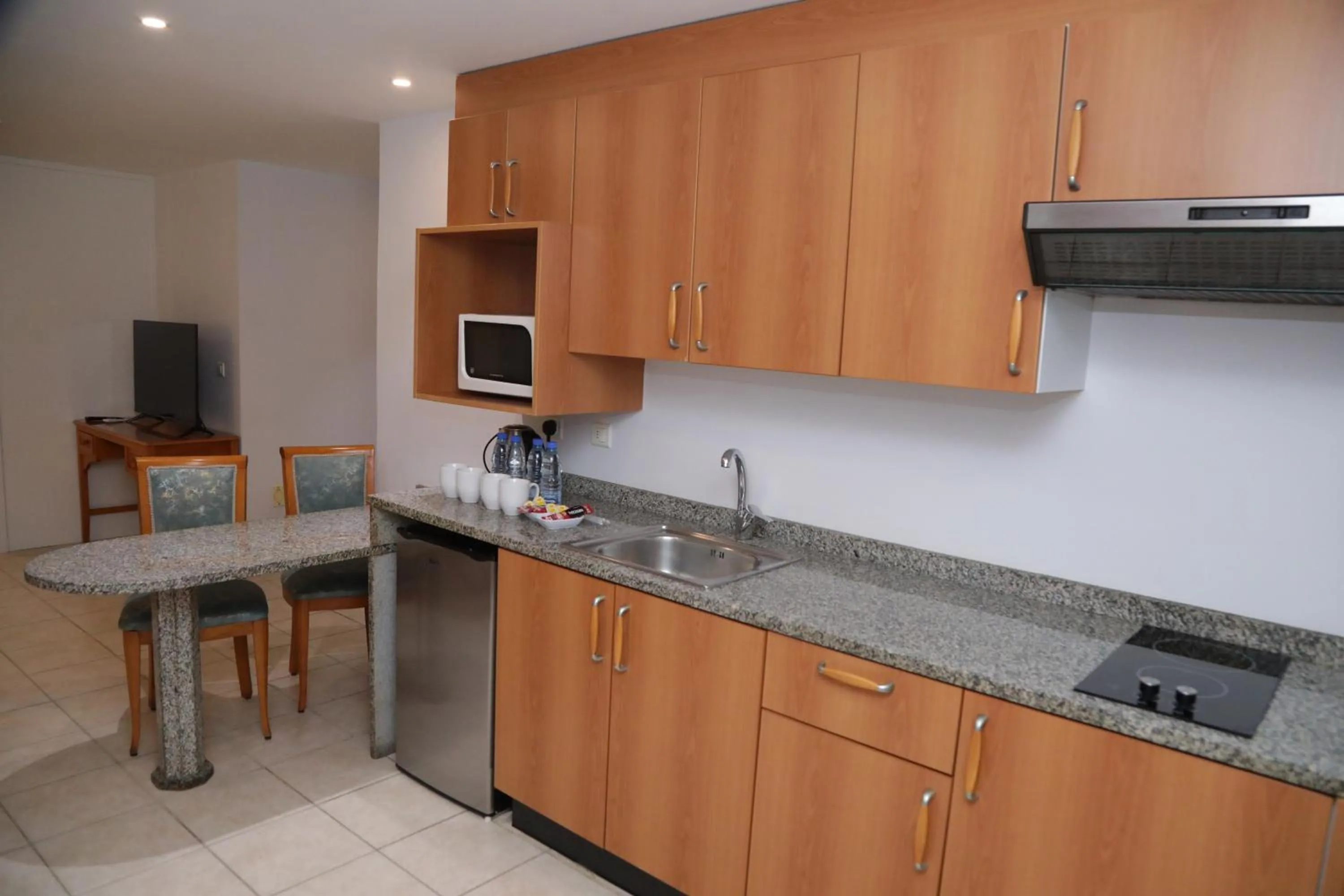 Kitchen or kitchenette in El Sheikh Suites Hotel