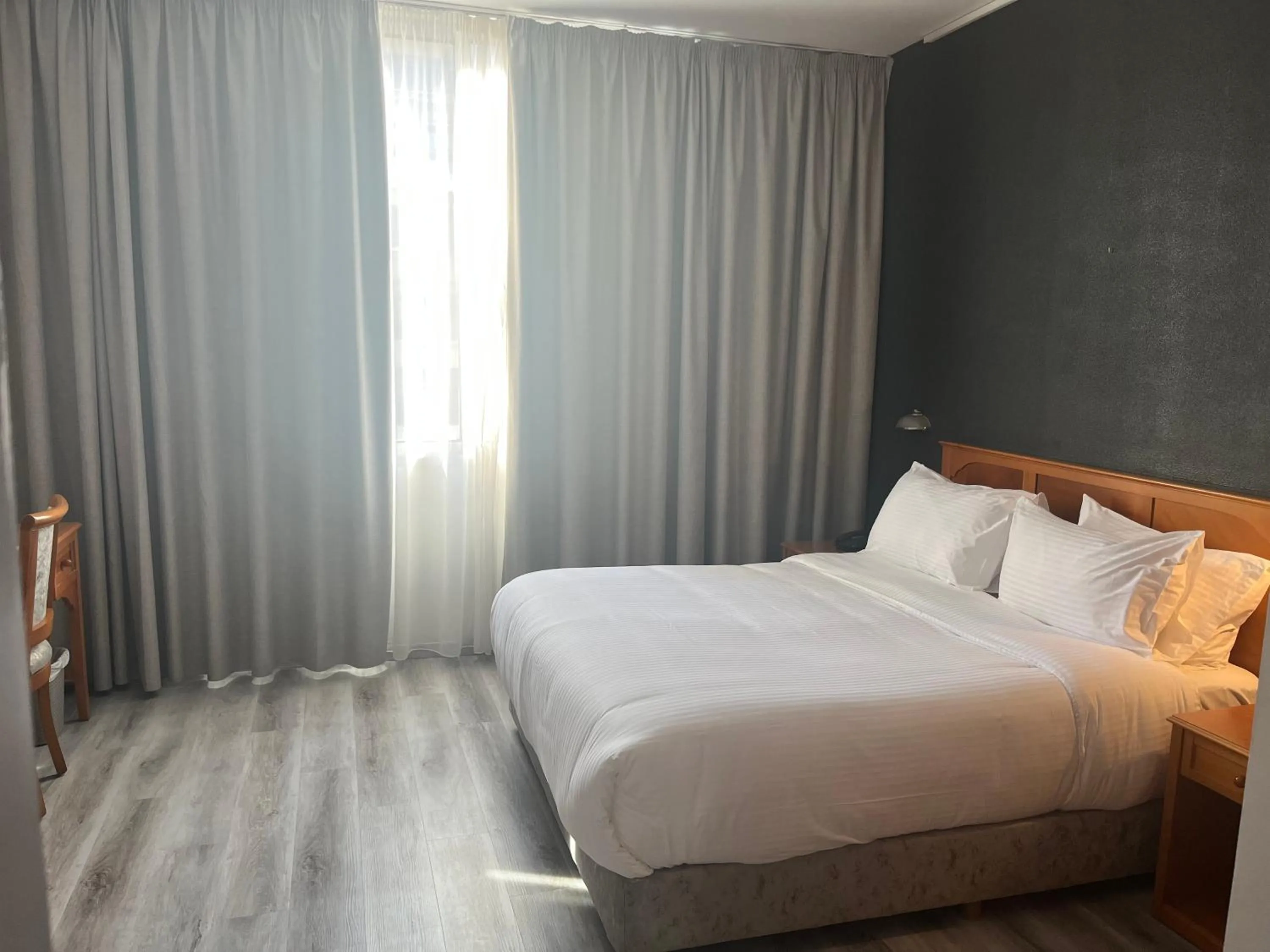 Bed in El Sheikh Suites Hotel