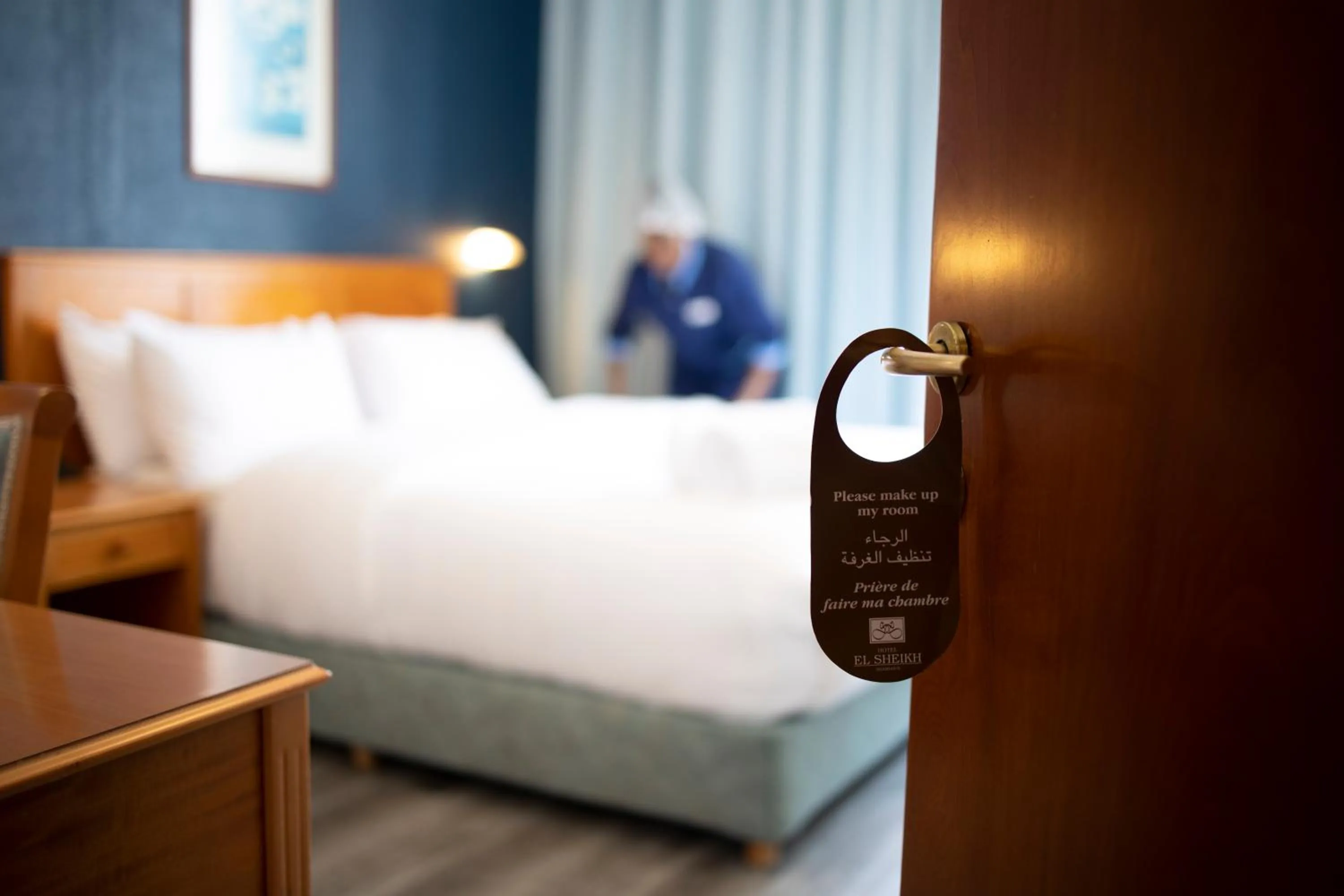 Bed in El Sheikh Suites Hotel