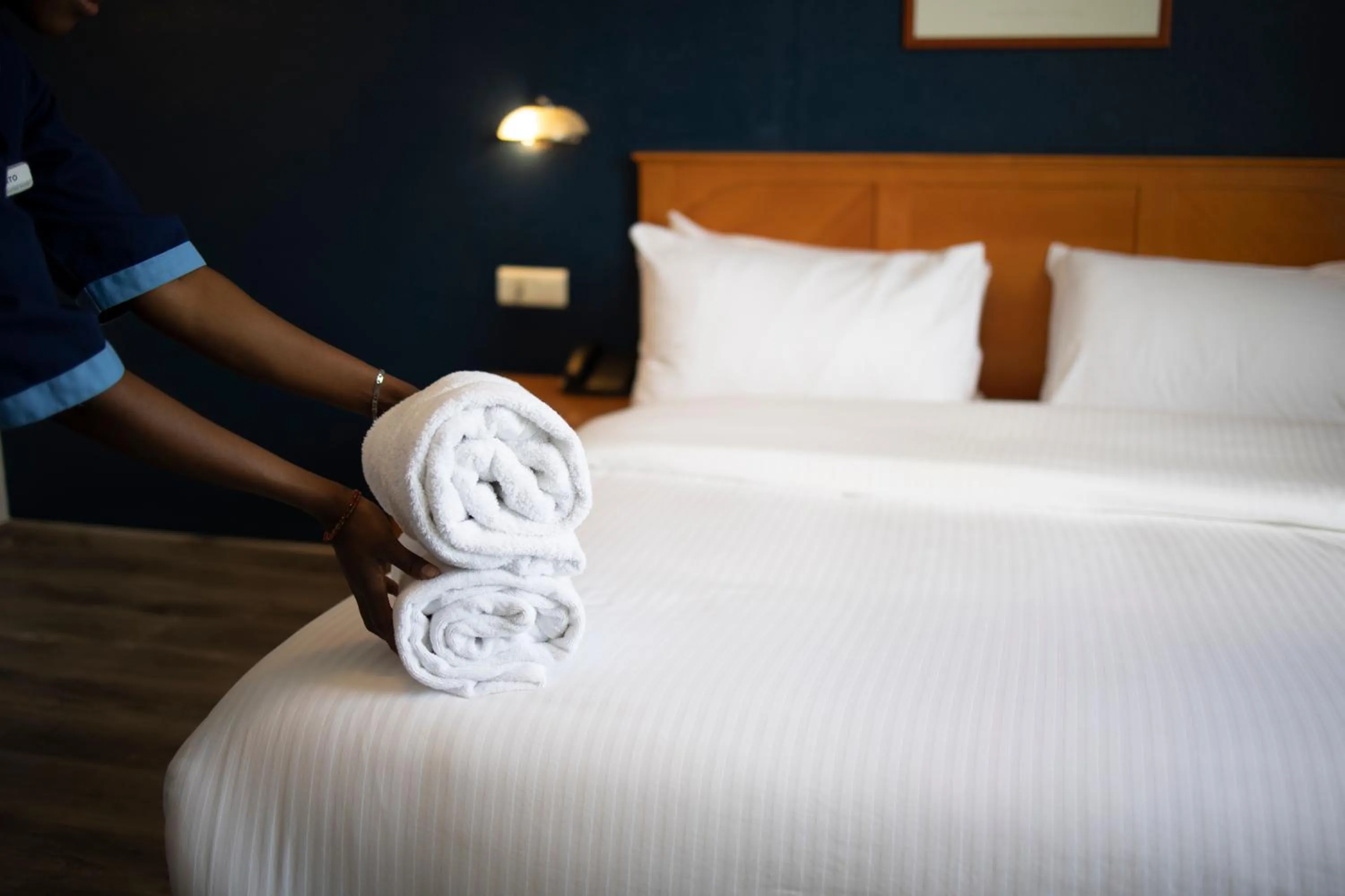 Bed in El Sheikh Suites Hotel