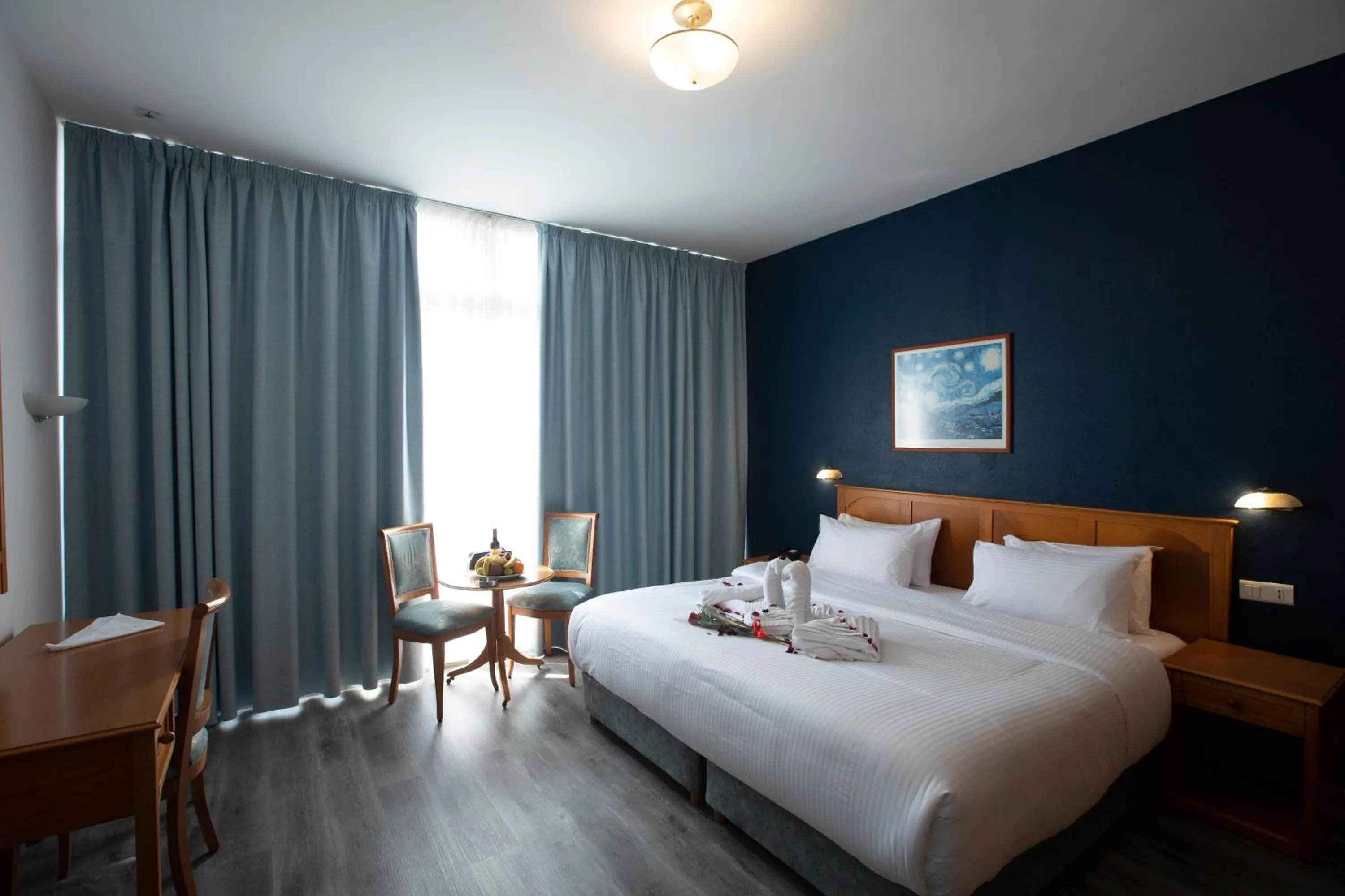 Bed in El Sheikh Suites Hotel