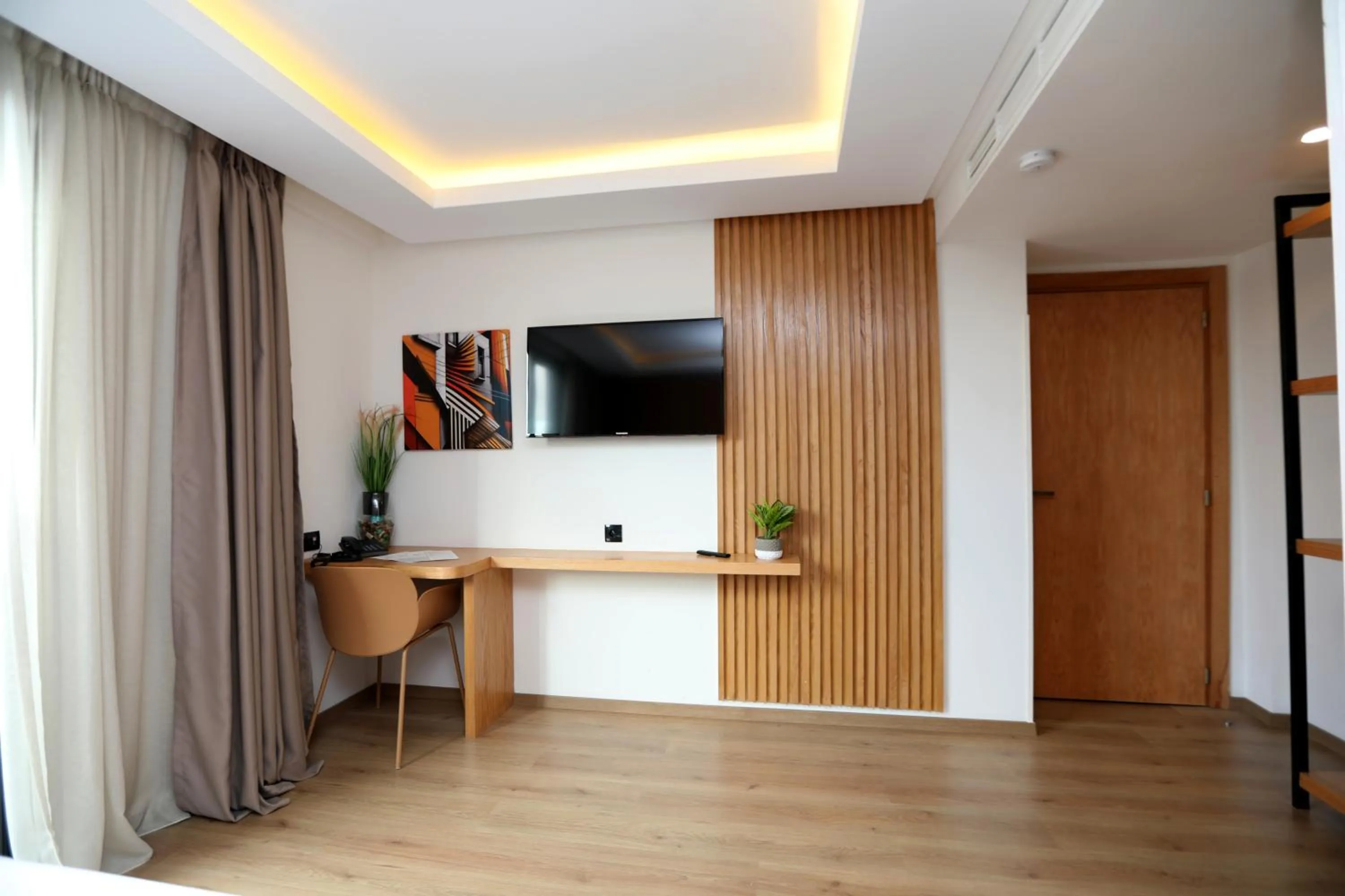 Communal lounge/ TV room in Unico Hotel & Spa Casablanca