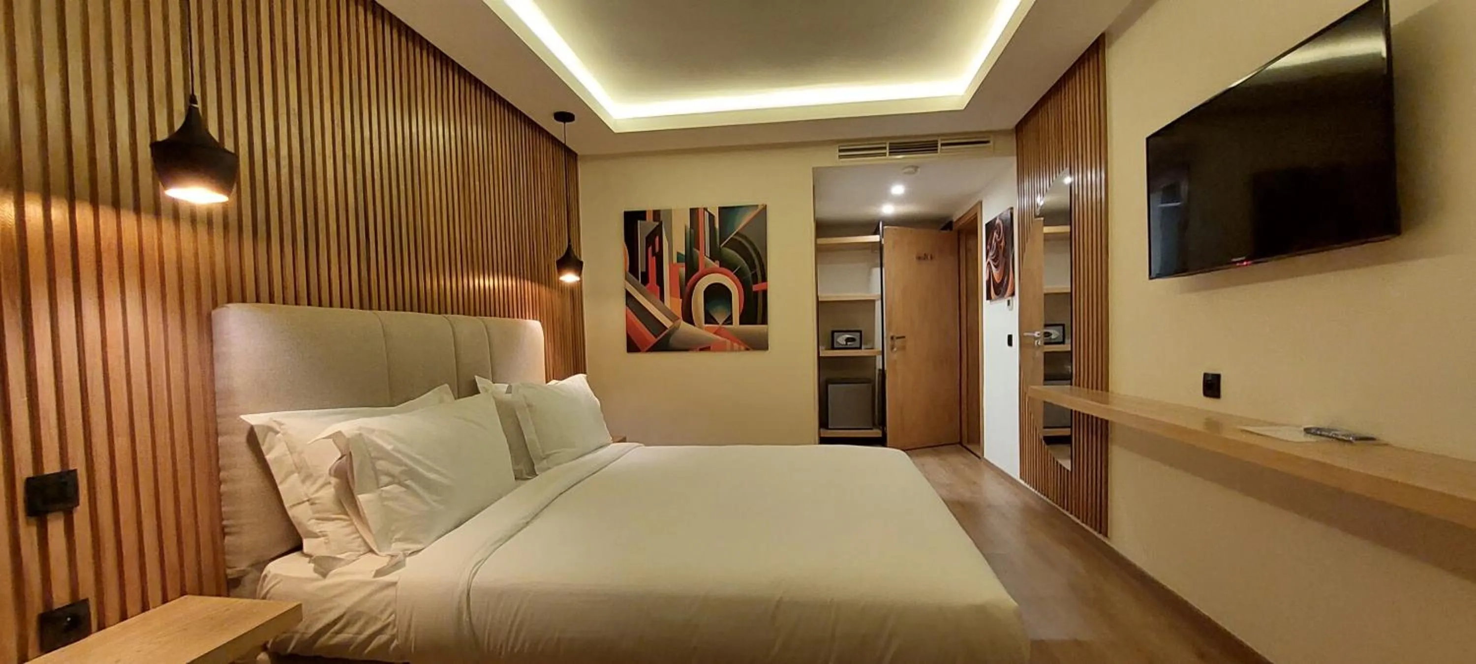 Communal lounge/ TV room, Bed in Unico Hotel & Spa Casablanca