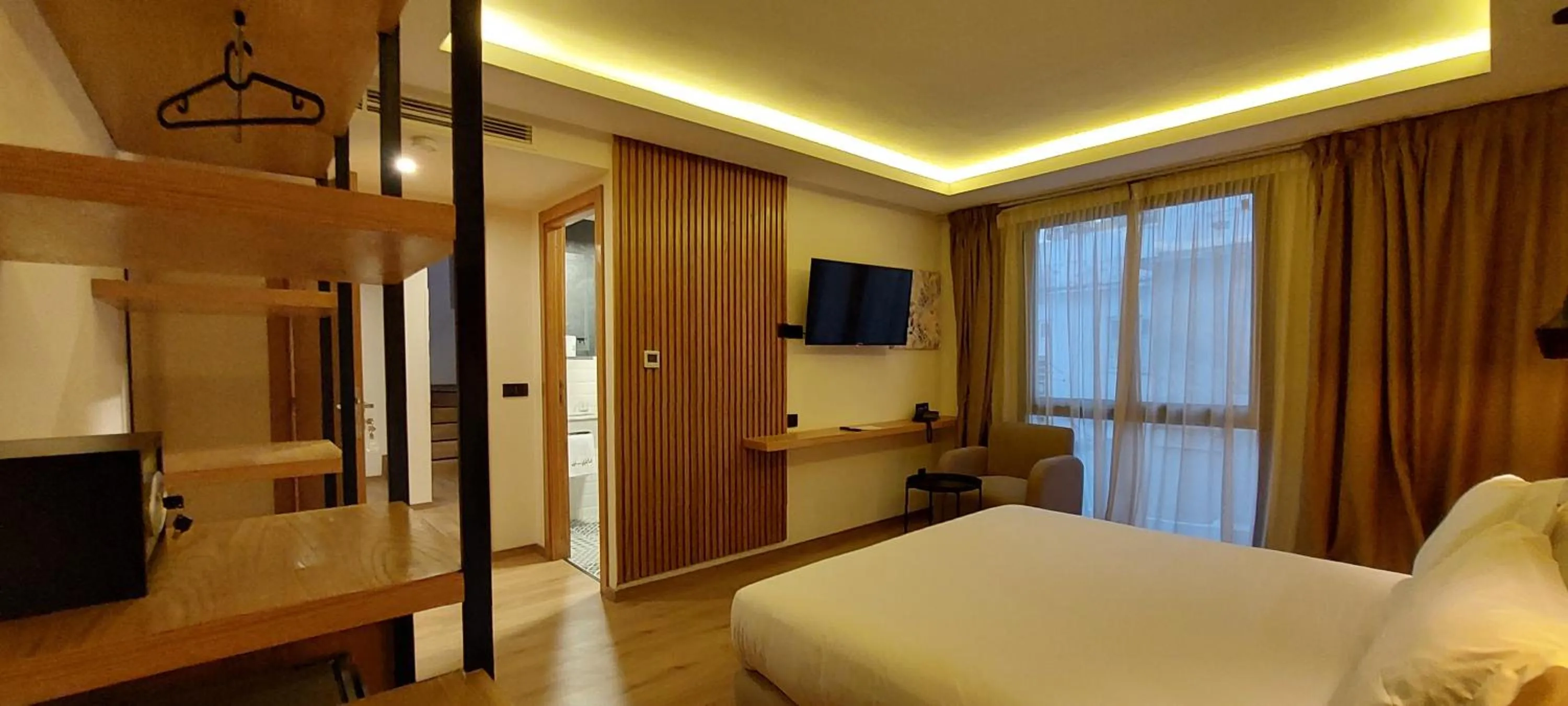 Communal lounge/ TV room, Bed in Unico Hotel & Spa Casablanca