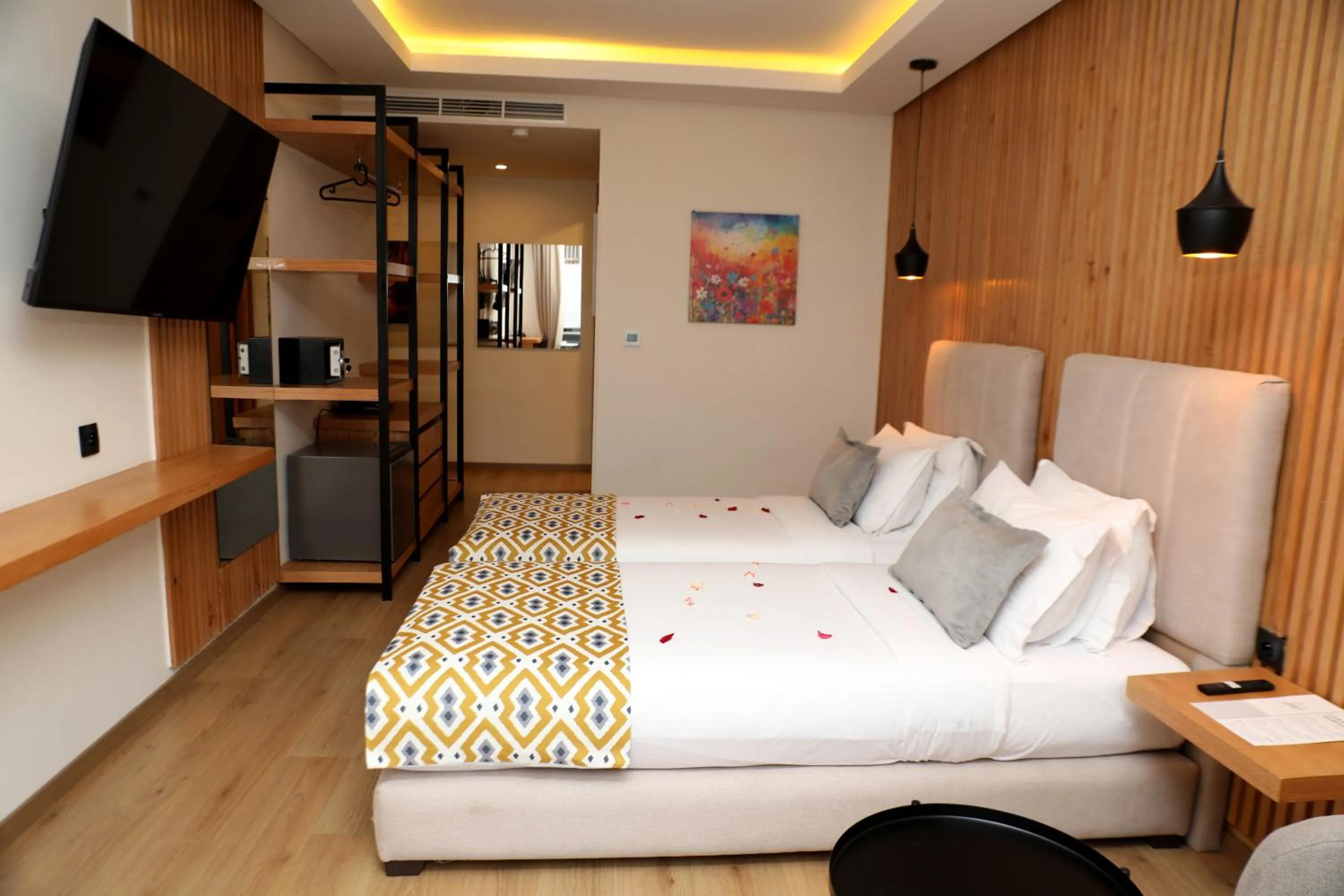 Communal lounge/ TV room, Bed in Unico Hotel & Spa Casablanca