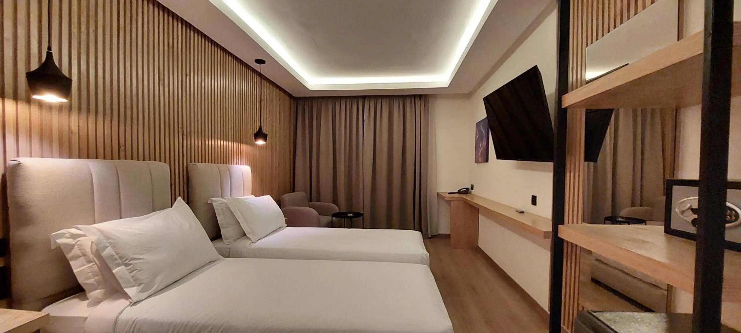 Communal lounge/ TV room in Unico Hotel & Spa Casablanca