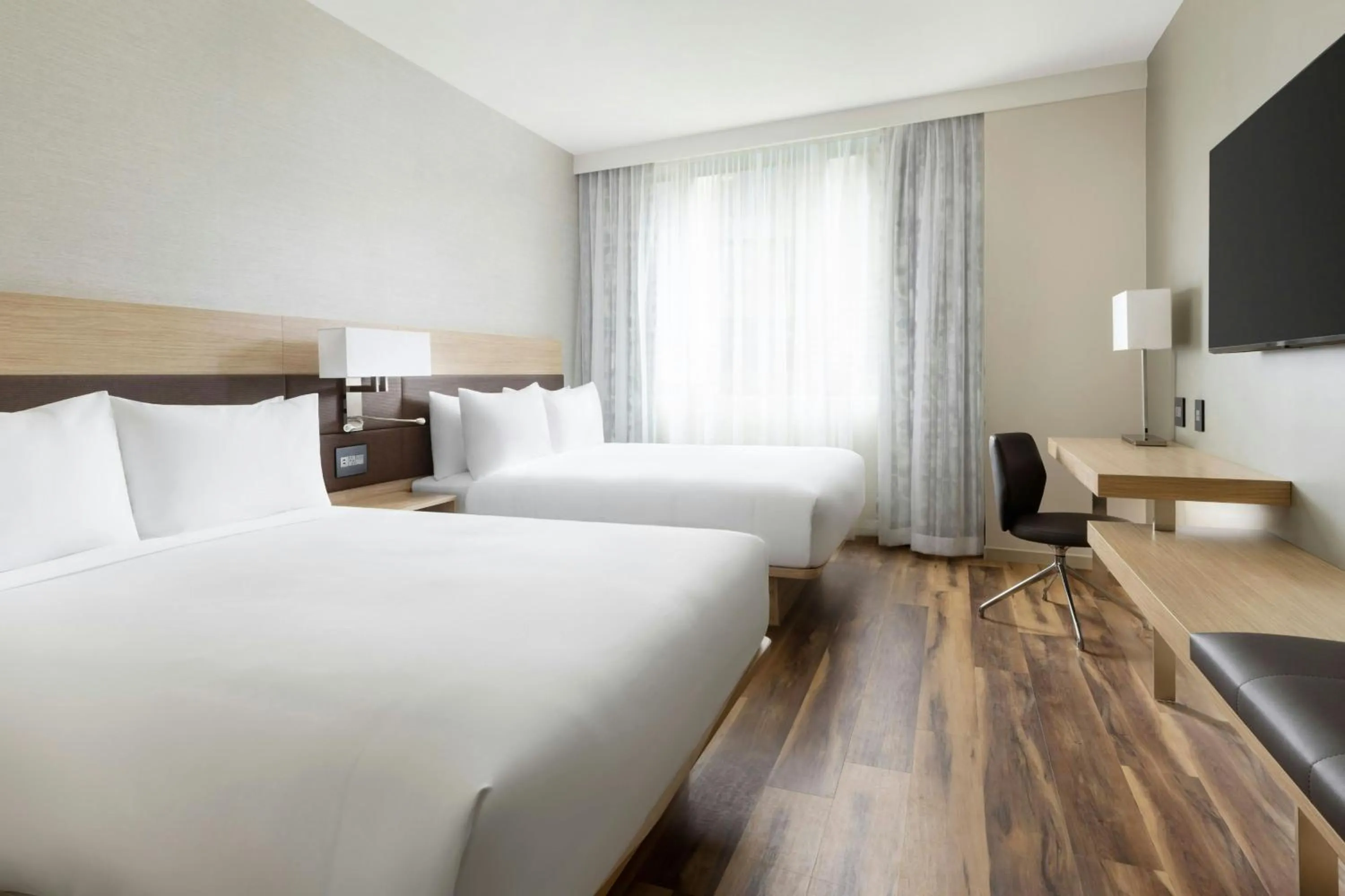 Photo of the whole room, Bed in AC Hotel by Marriott Honolulu