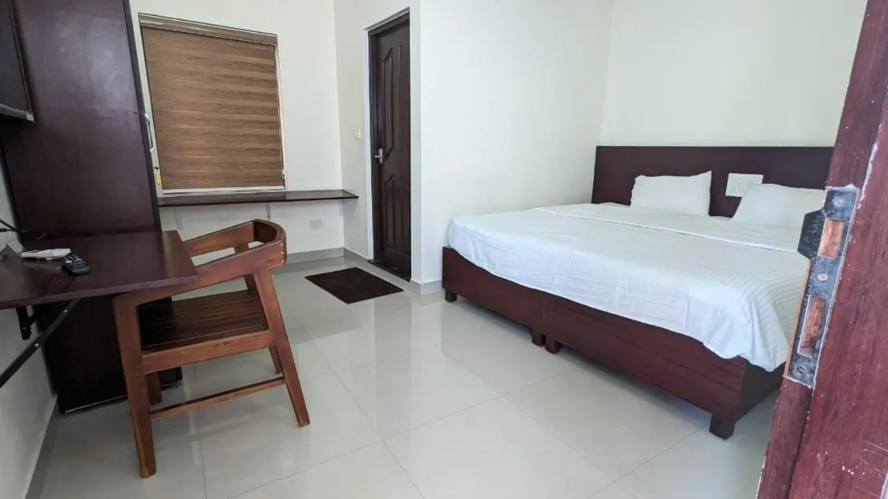 Bed in Masterkey Deluxe Rooms