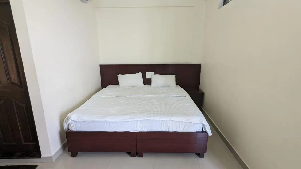 Bed in Masterkey Deluxe Rooms