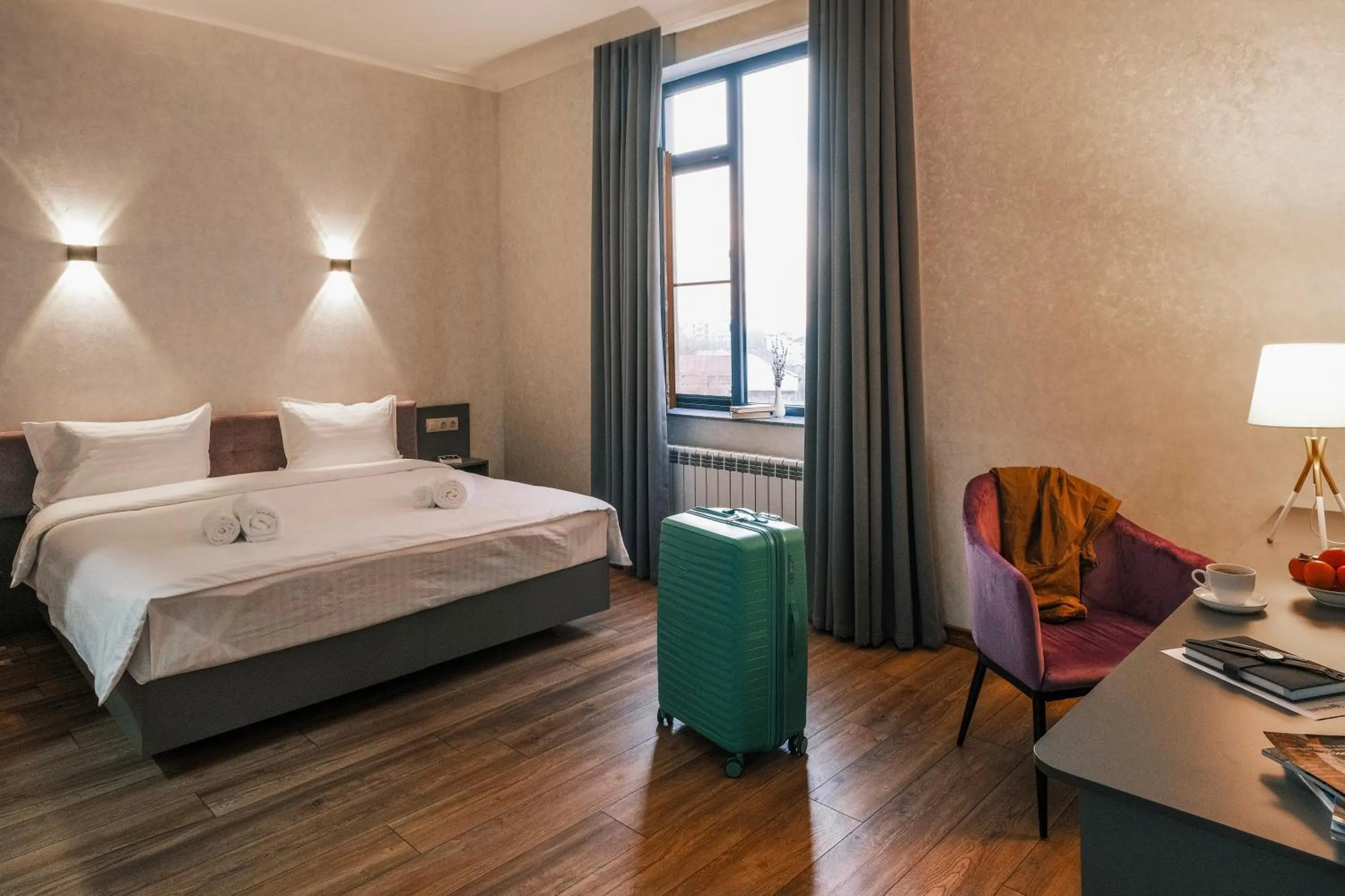 Bed in Parklane Hotel