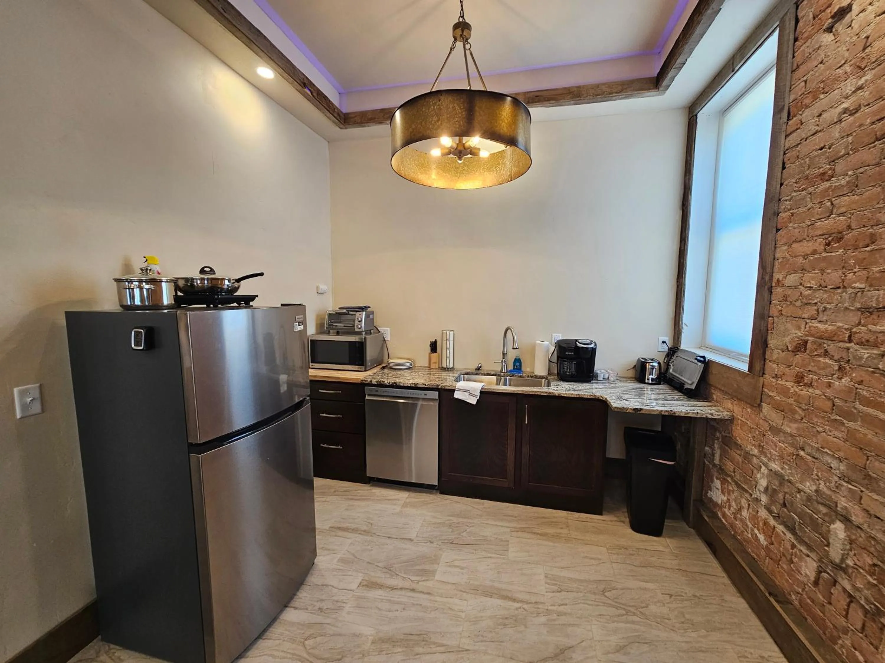 Kitchen or kitchenette in Eaglescape Suites and Event Center