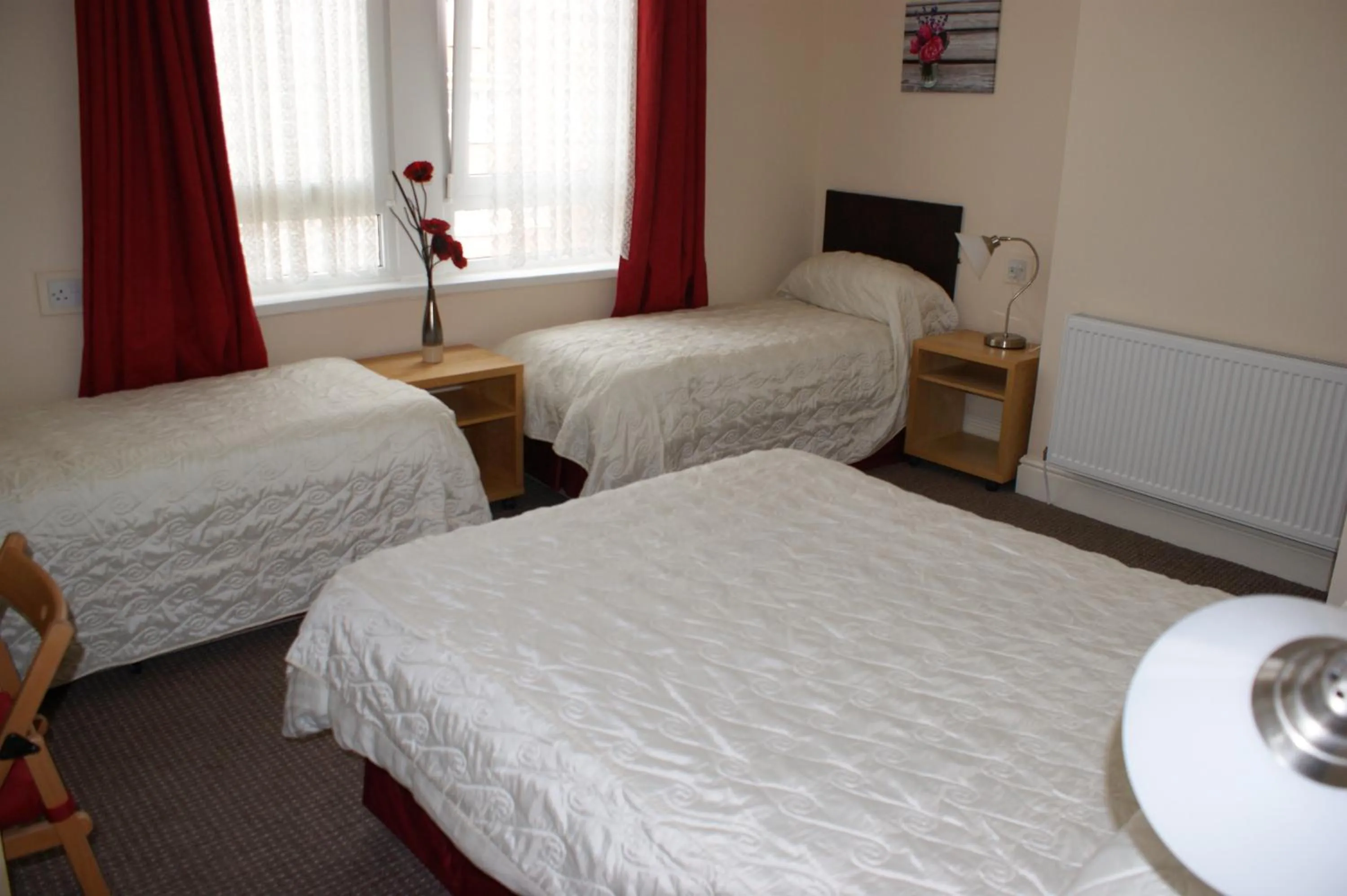 Bed in Beachcomber Hotel