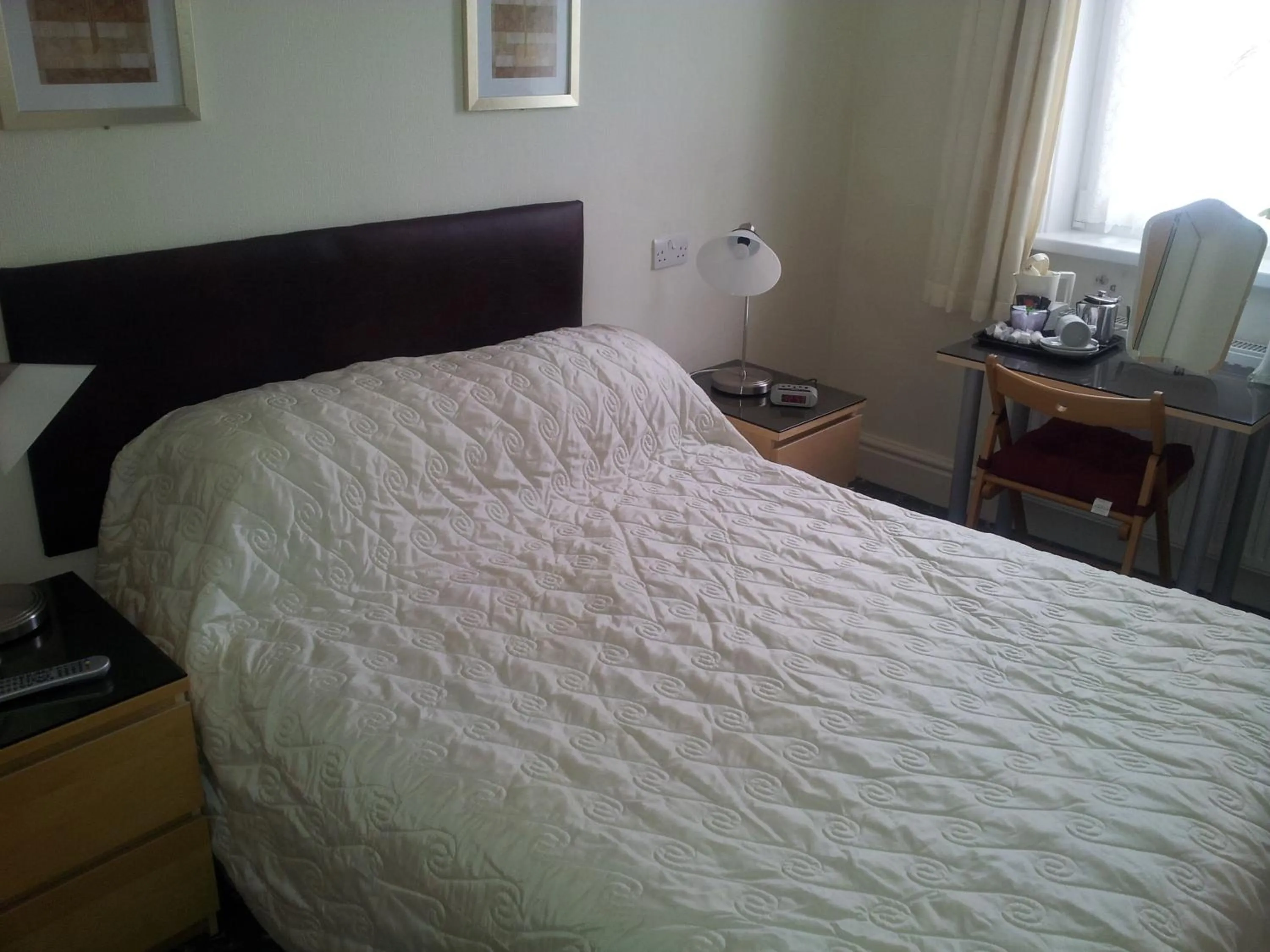 Bed in Beachcomber Hotel