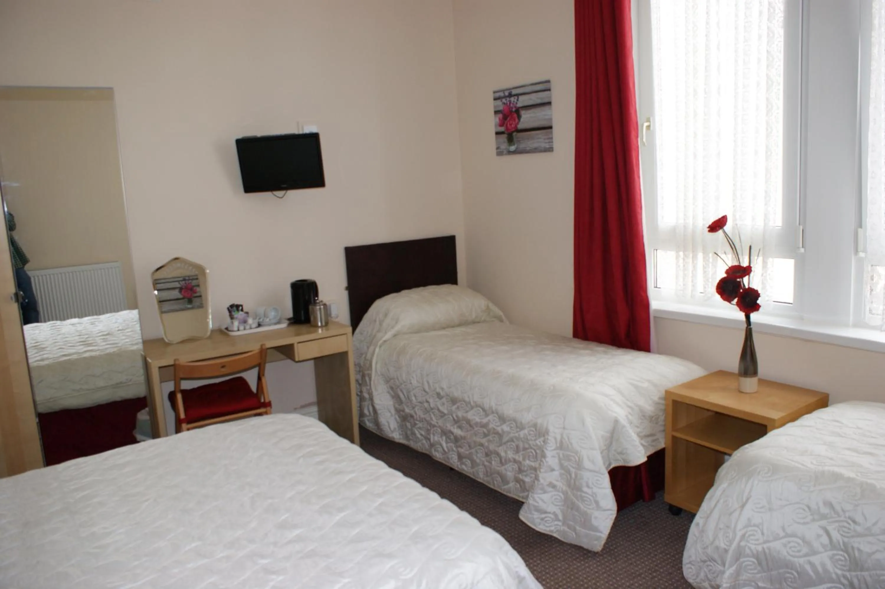 Bed in Beachcomber Hotel