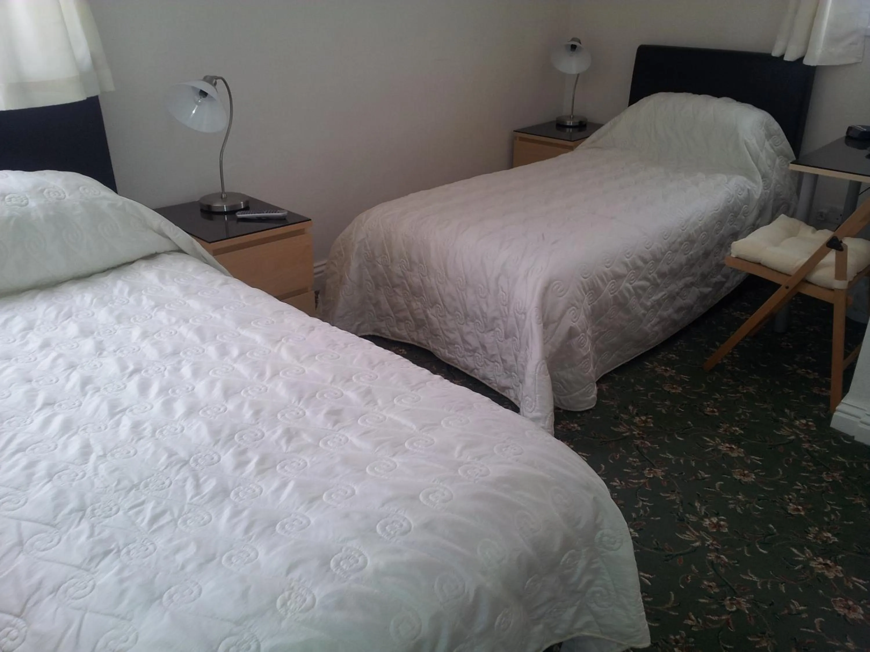 Bed in Beachcomber Hotel