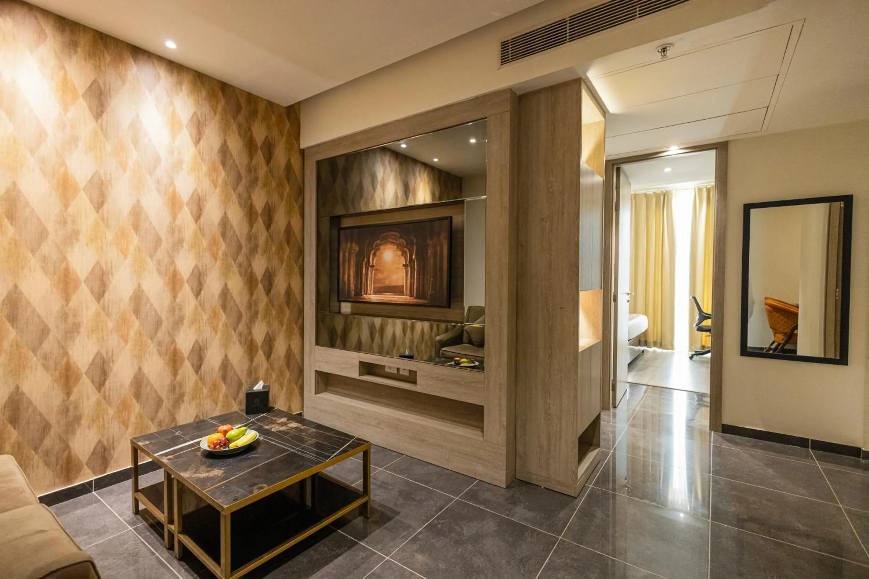 Living room in Rhythm Gurugram Hotel & Suites, Sohna Road