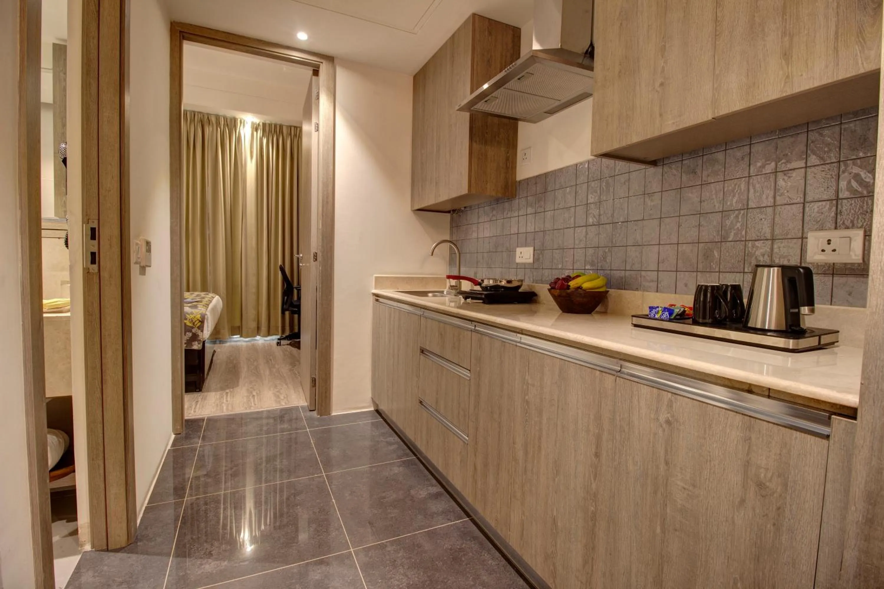 kitchen in Rhythm Gurugram Hotel & Suites, Sohna Road