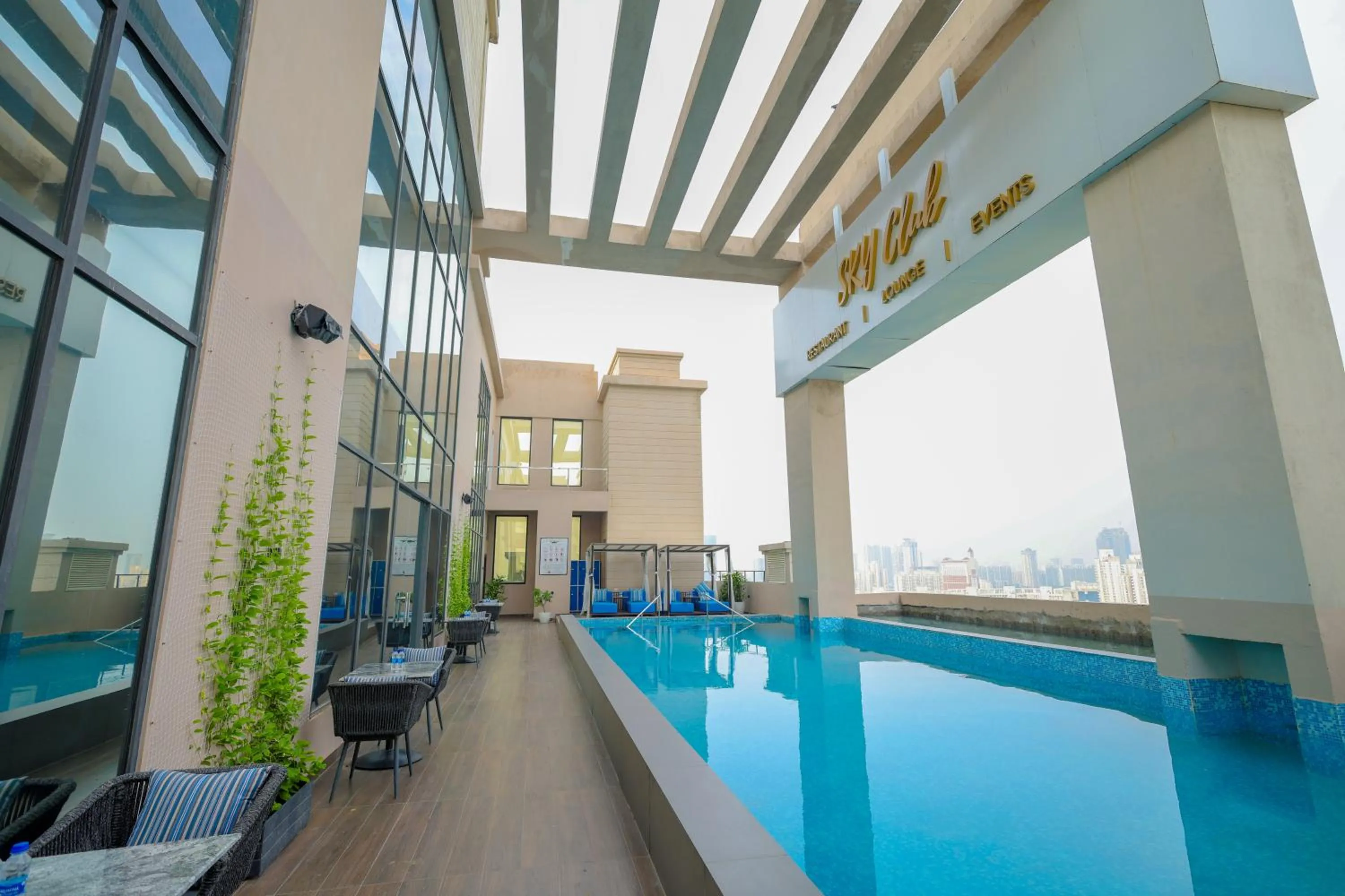 Swimming pool in Rhythm Gurugram Hotel & Suites, Sohna Road