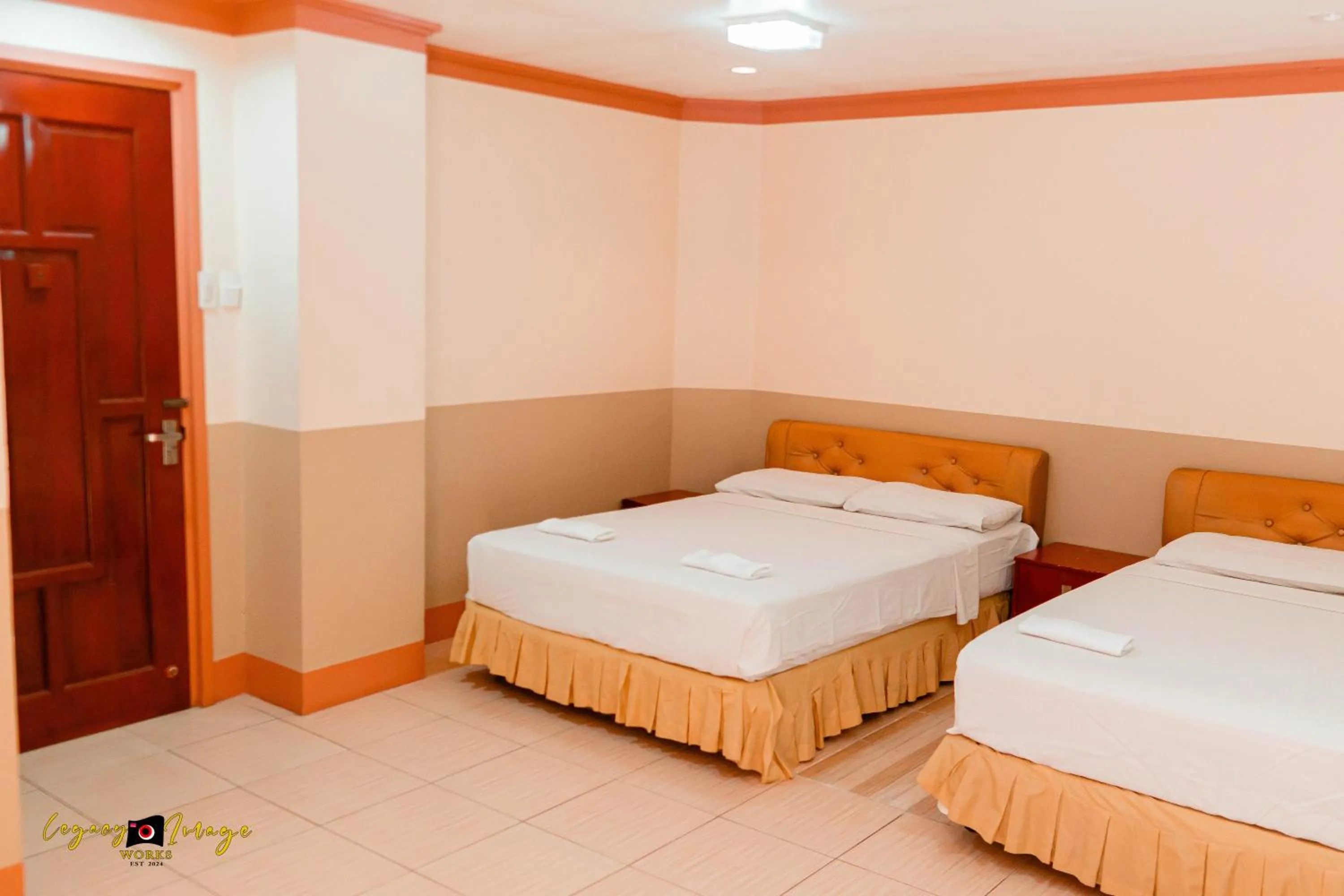 Bed in Imperial Ridge Pension House