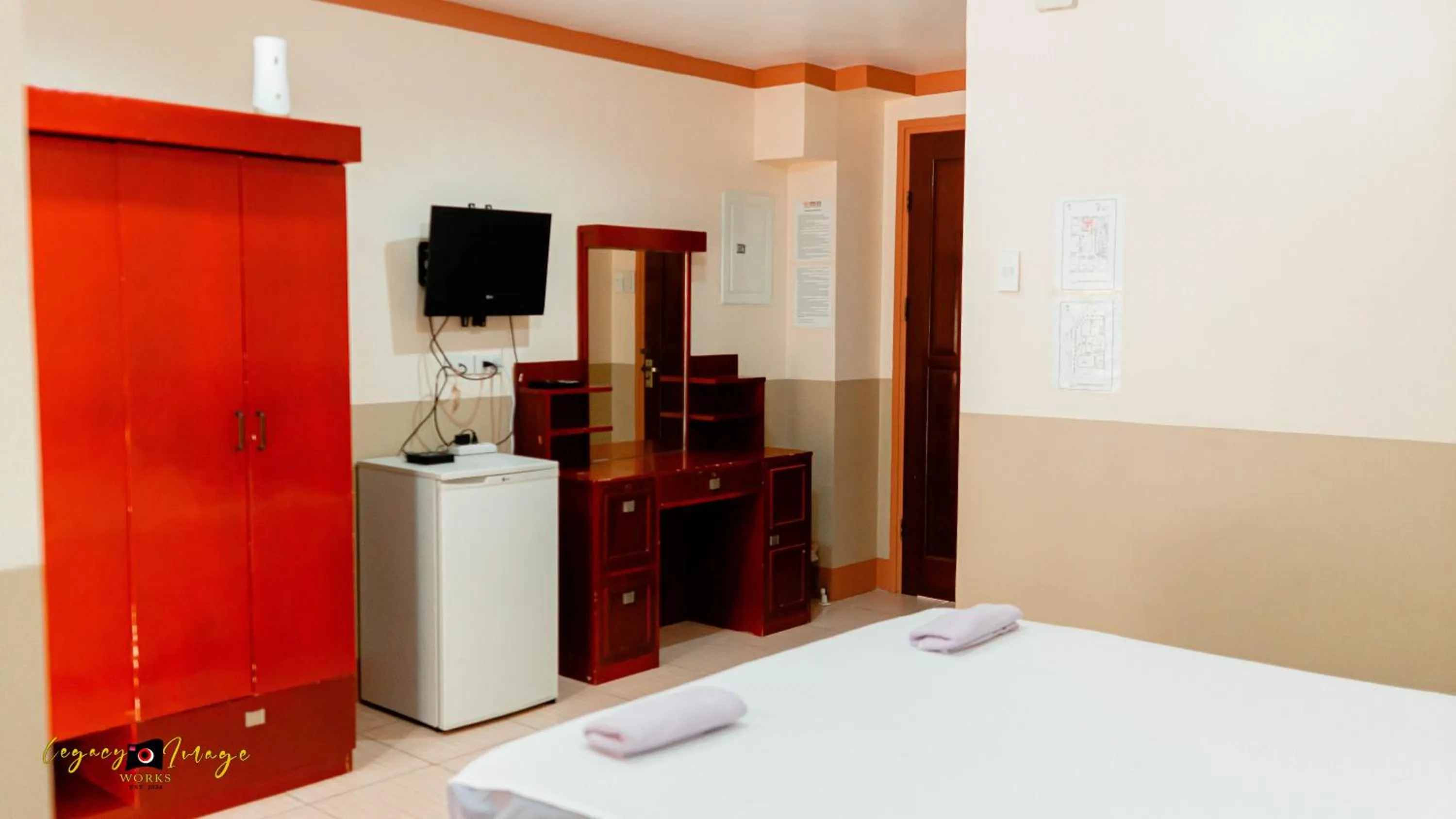 towels, Bed in Imperial Ridge Pension House