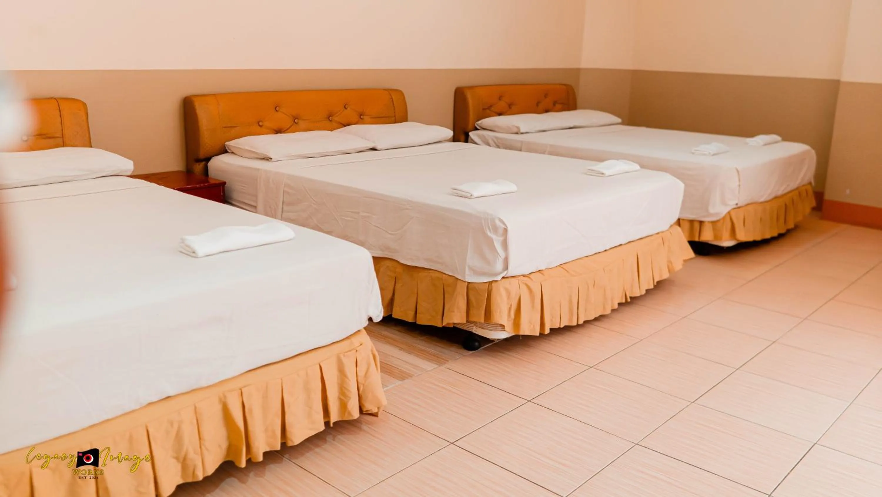 Bed in Imperial Ridge Pension House