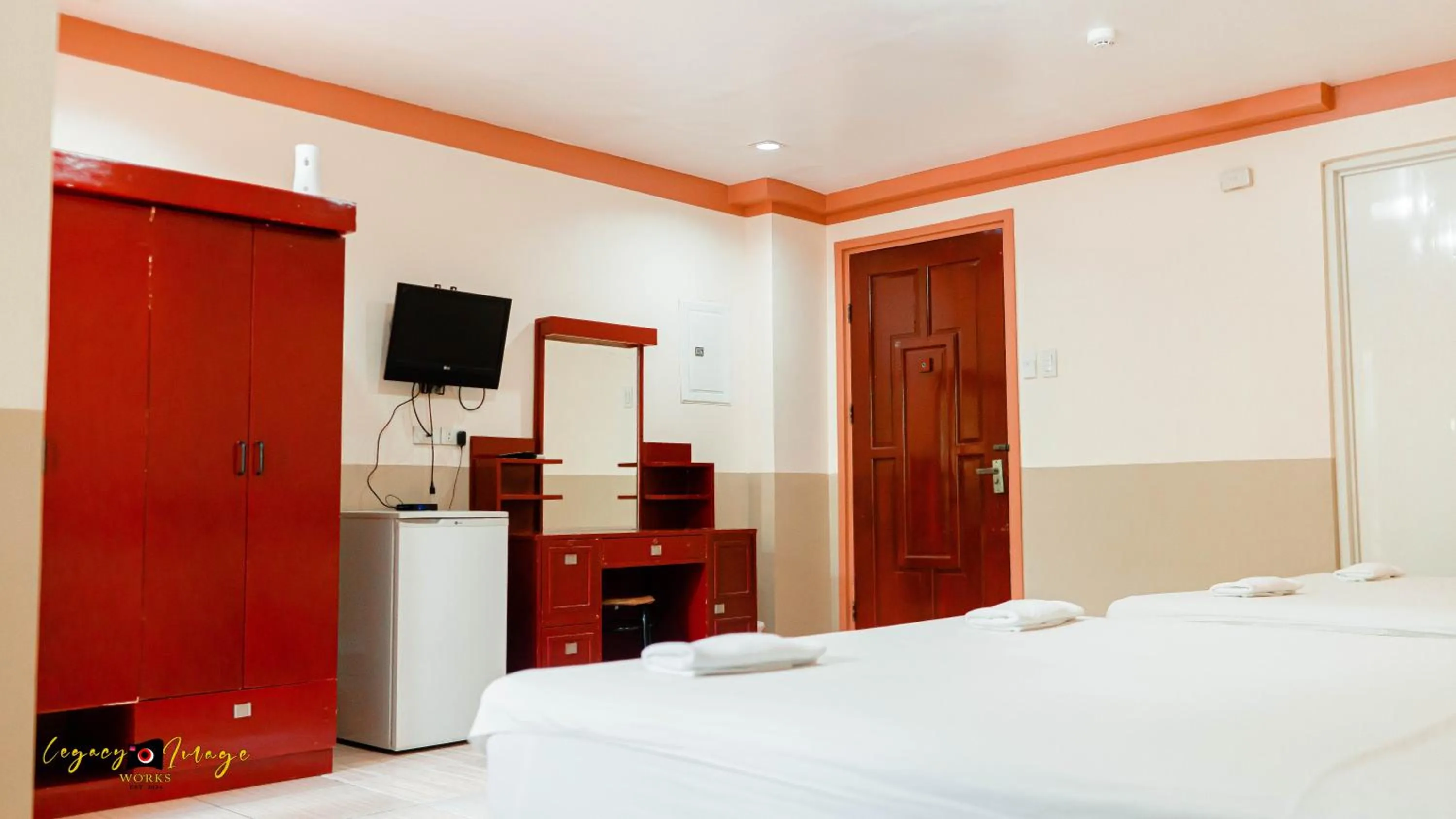 Bed in Imperial Ridge Pension House