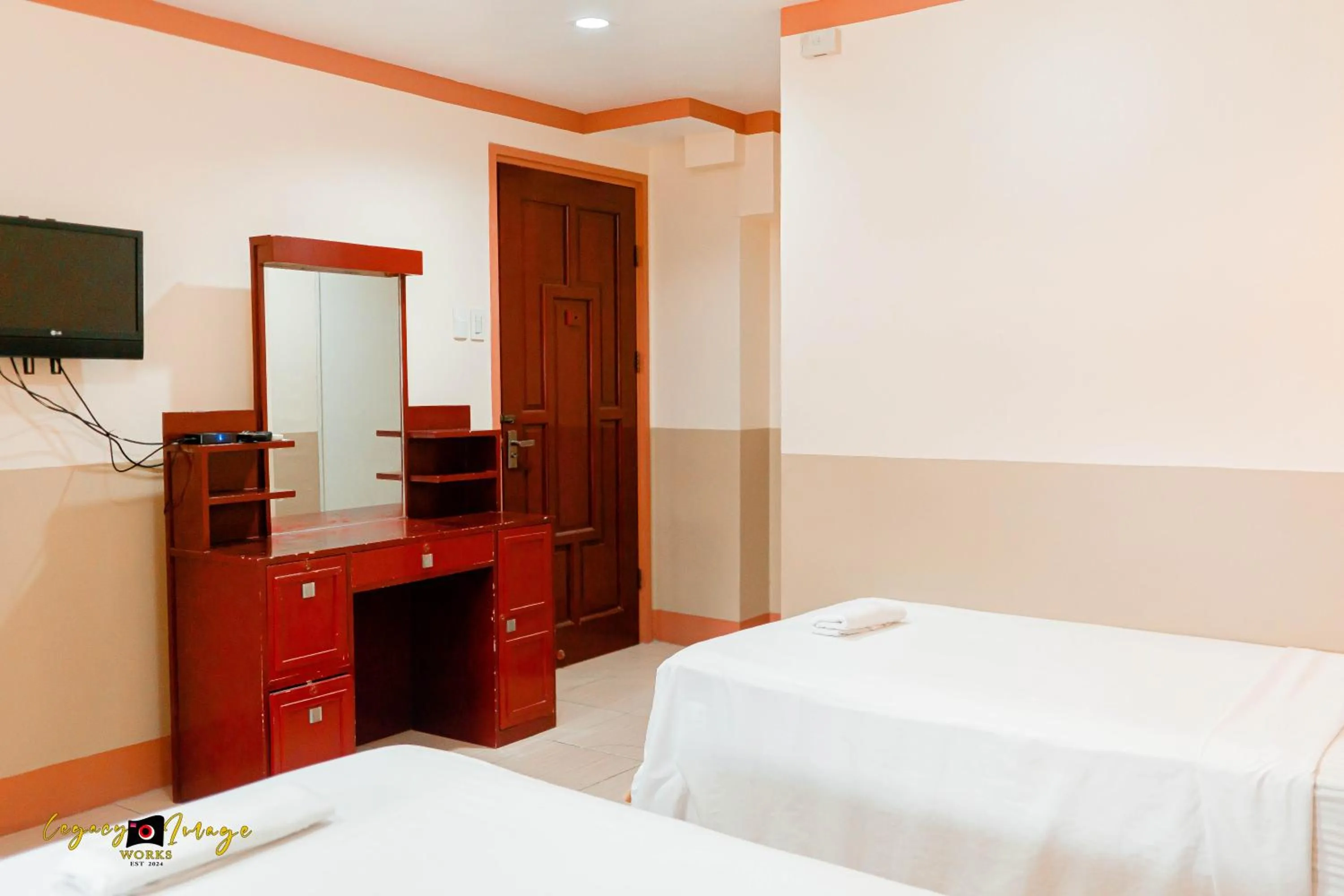 Bed in Imperial Ridge Pension House