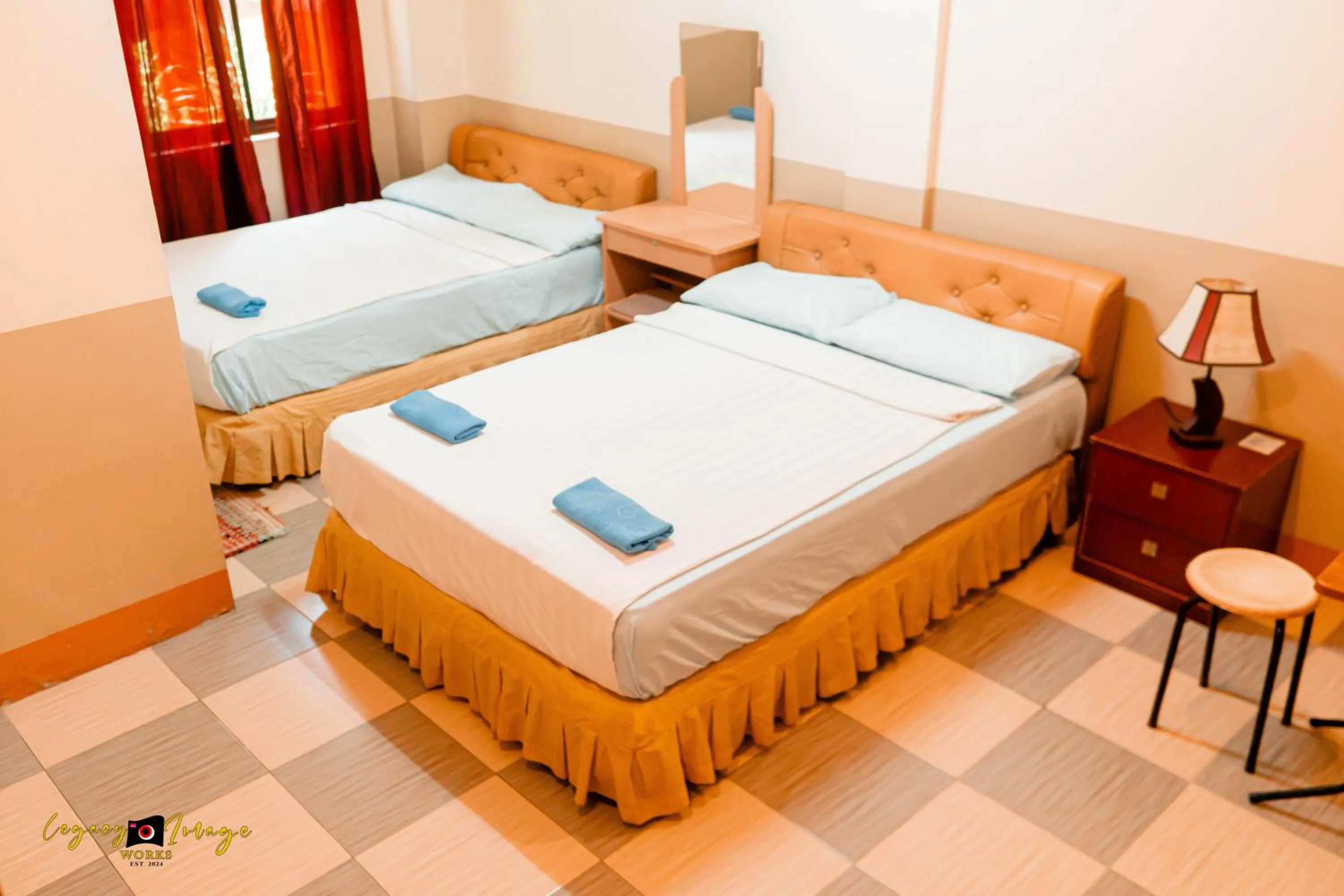 Bed in Imperial Ridge Pension House